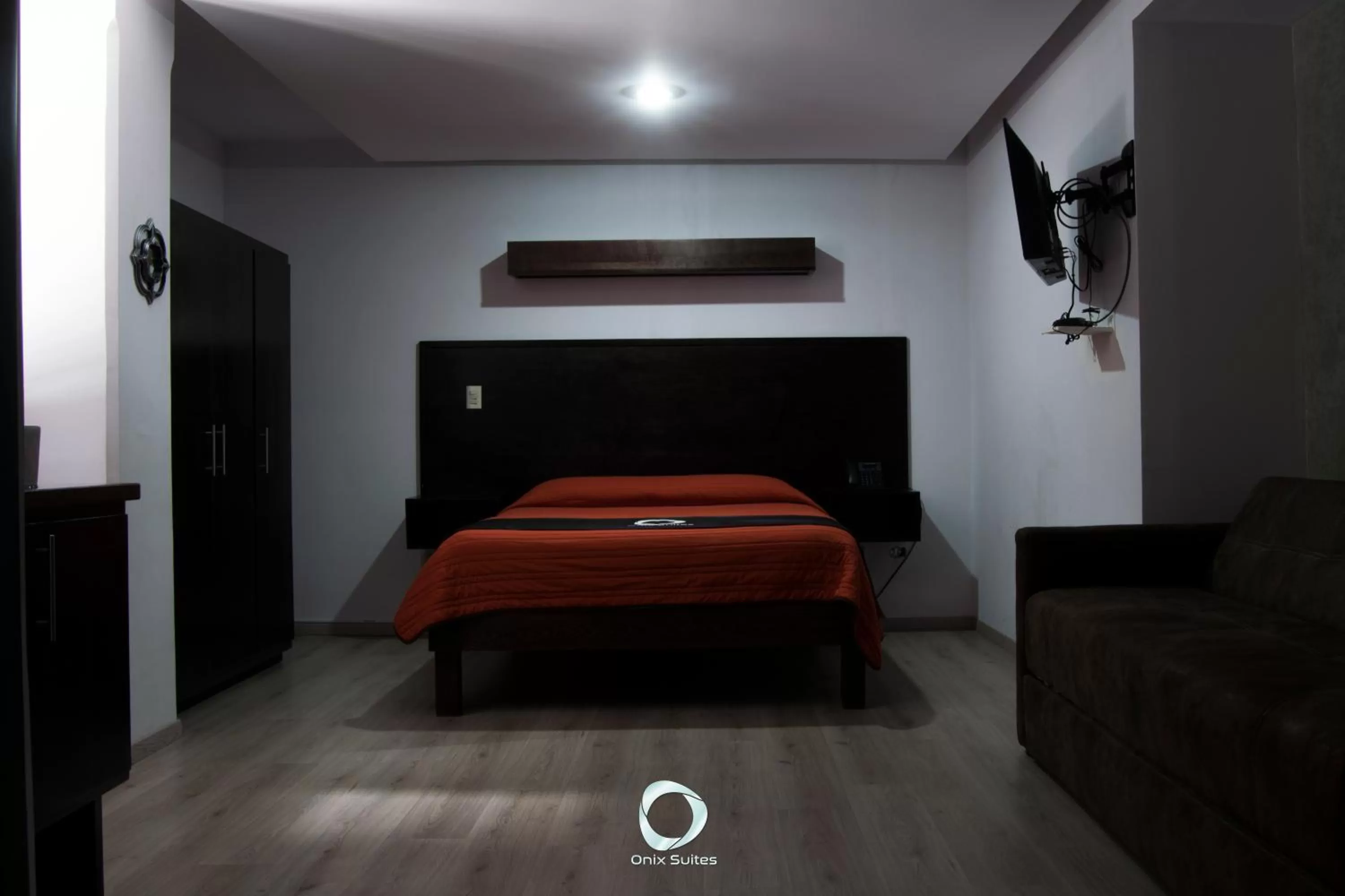 Bed in Hotel Onix Suites