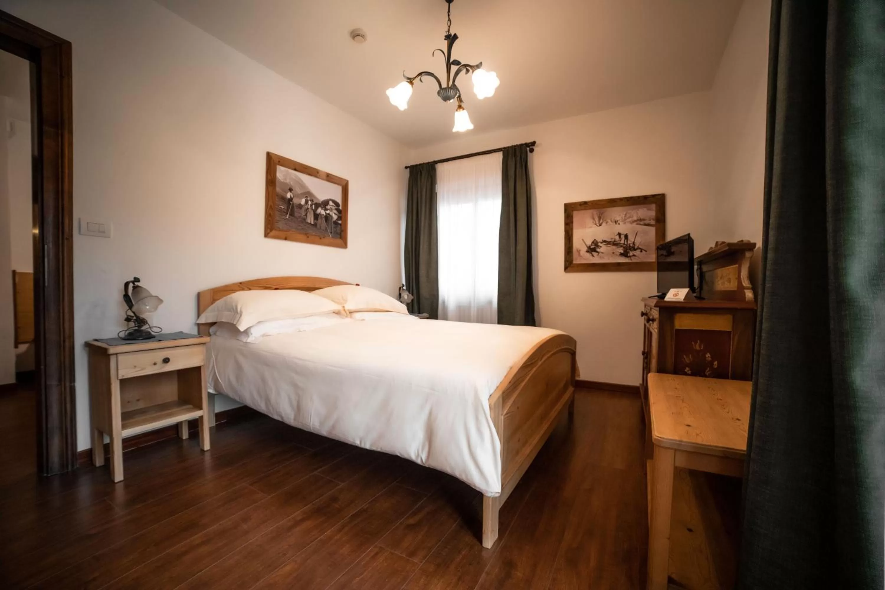 Bed in Hotel Panda Cortina- ricarica auto elettriche