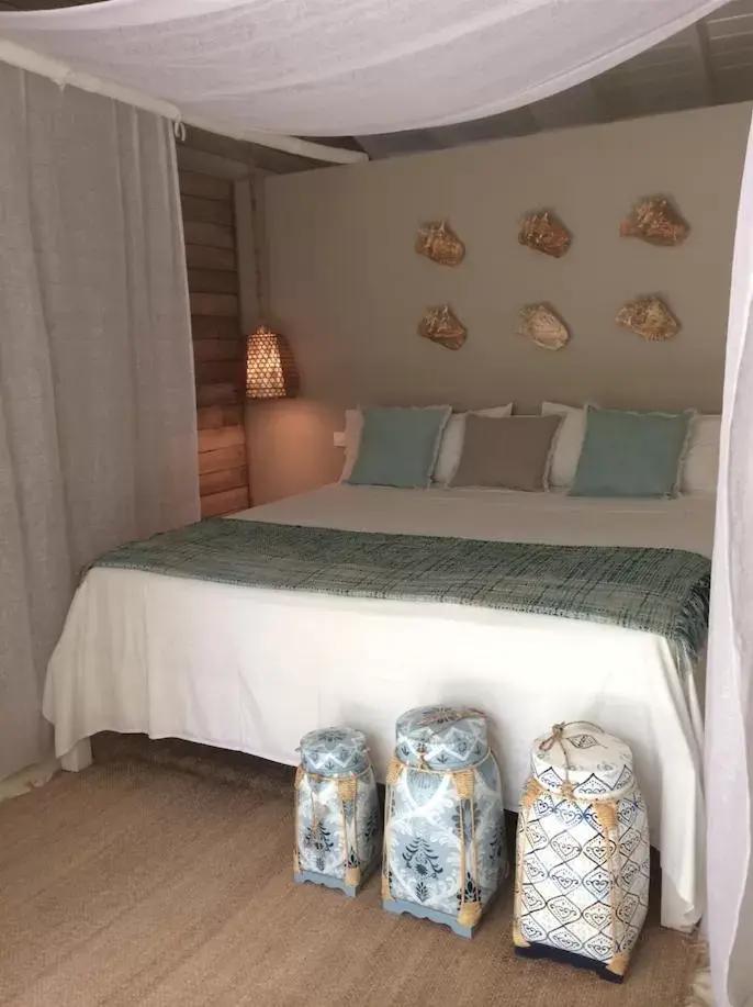 Bed in Mahona Boutique Hotel