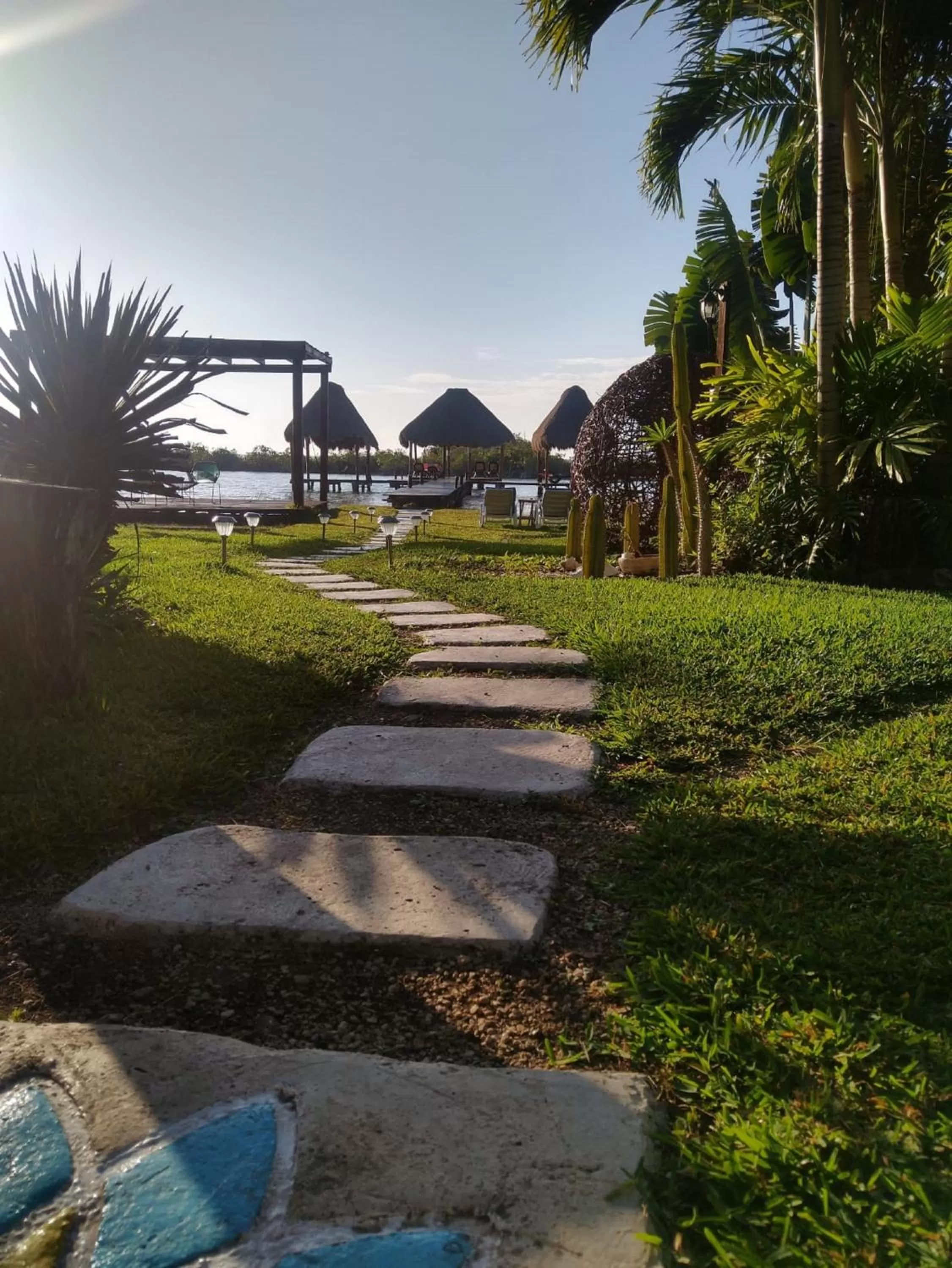 Sunrise, Garden in Casa Shiva Bacalar by MIJ