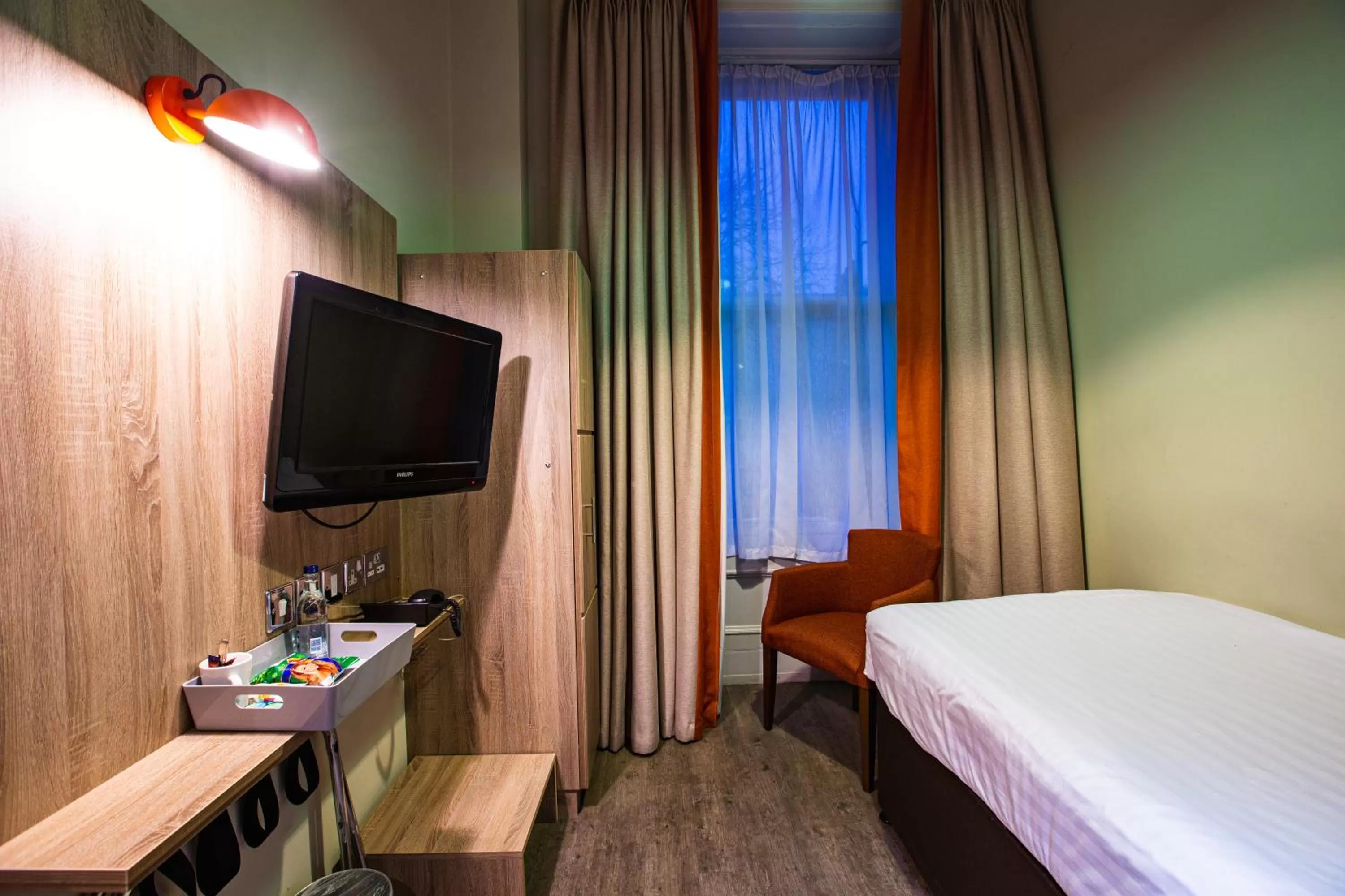 Bed in Cairn Hotel & Apartments