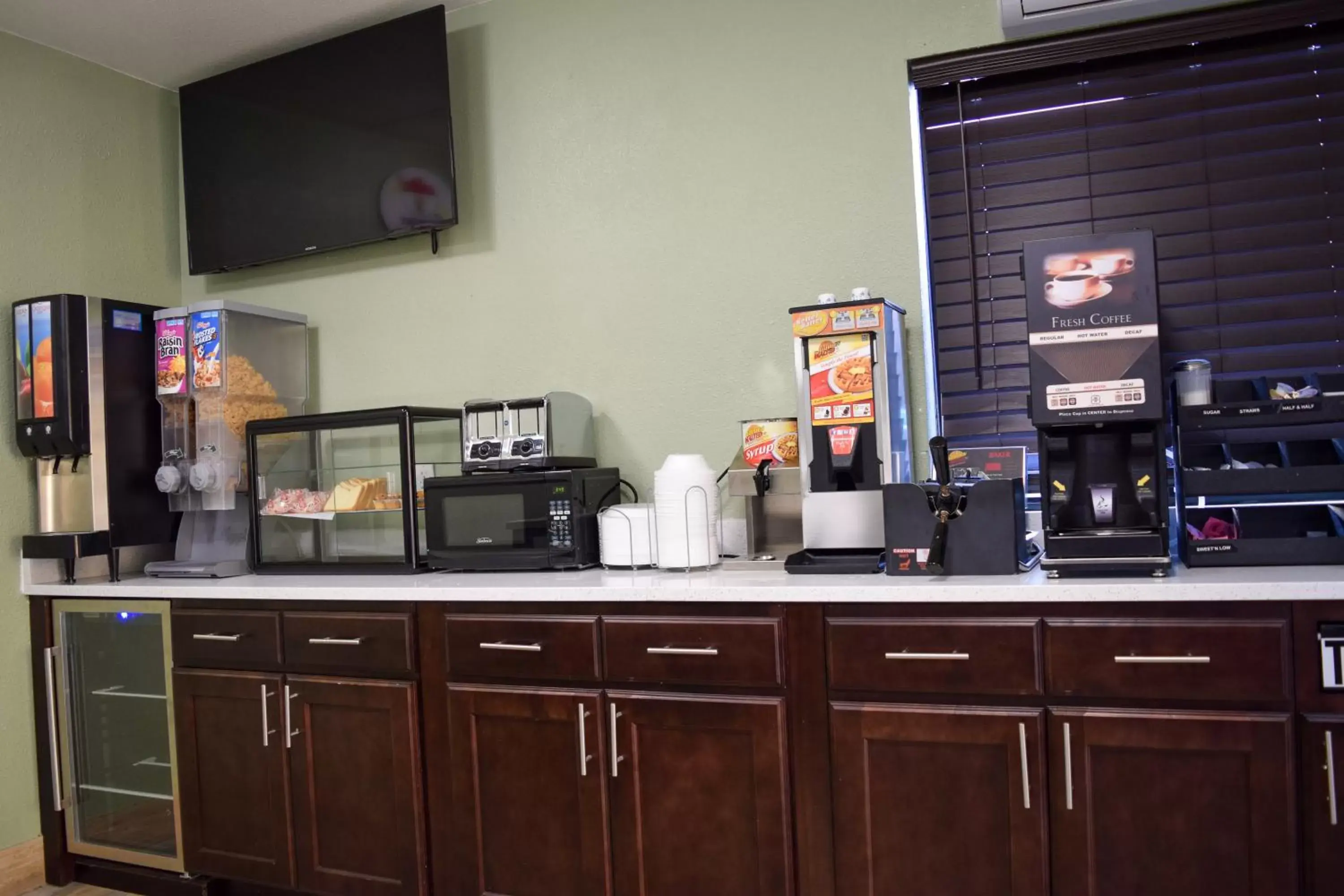 Coffee/tea facilities, Kitchen/Kitchenette in Super 8 Downtown Raleigh