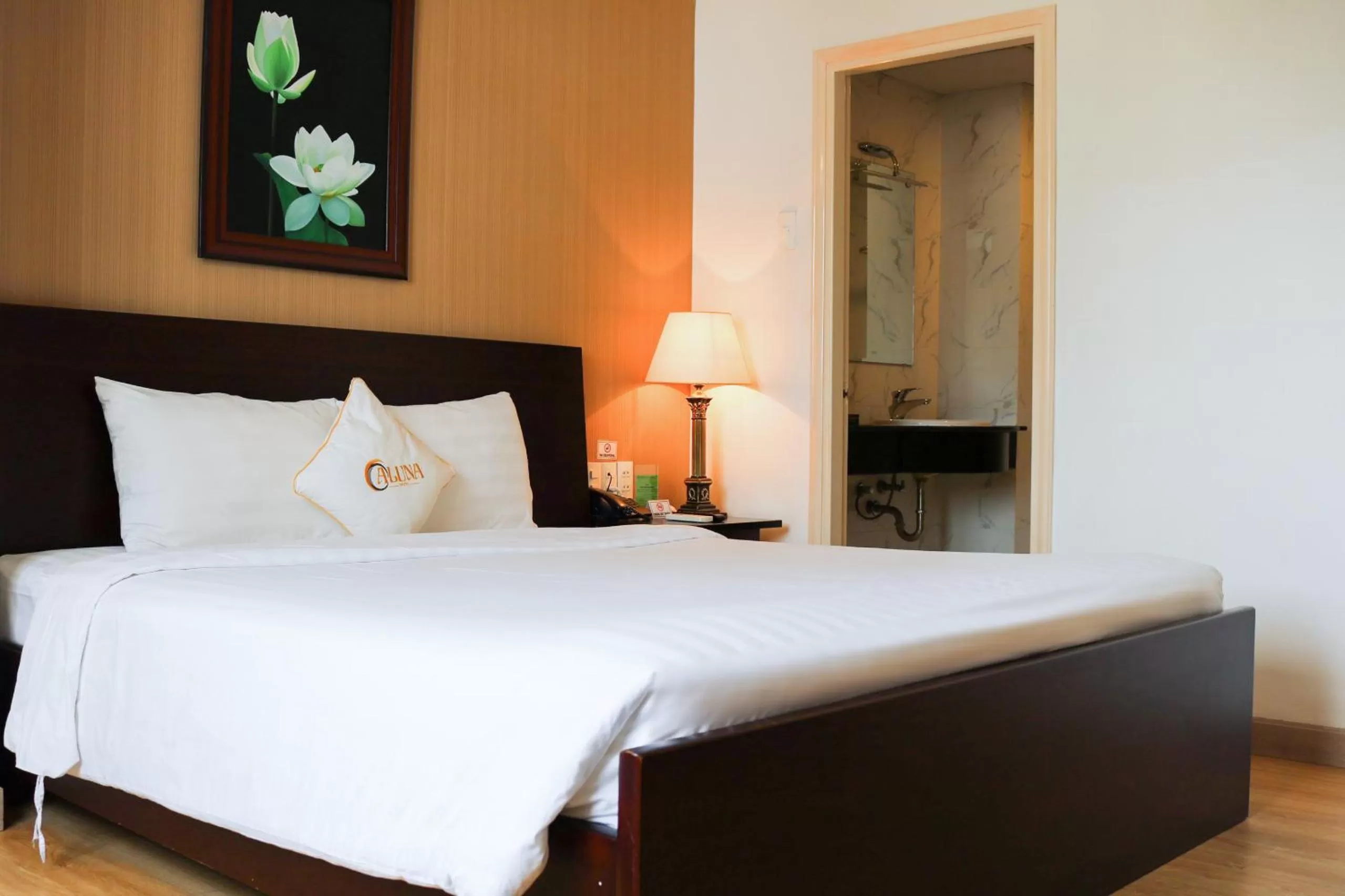 Bed in ALUNA Ben Thanh Hotel