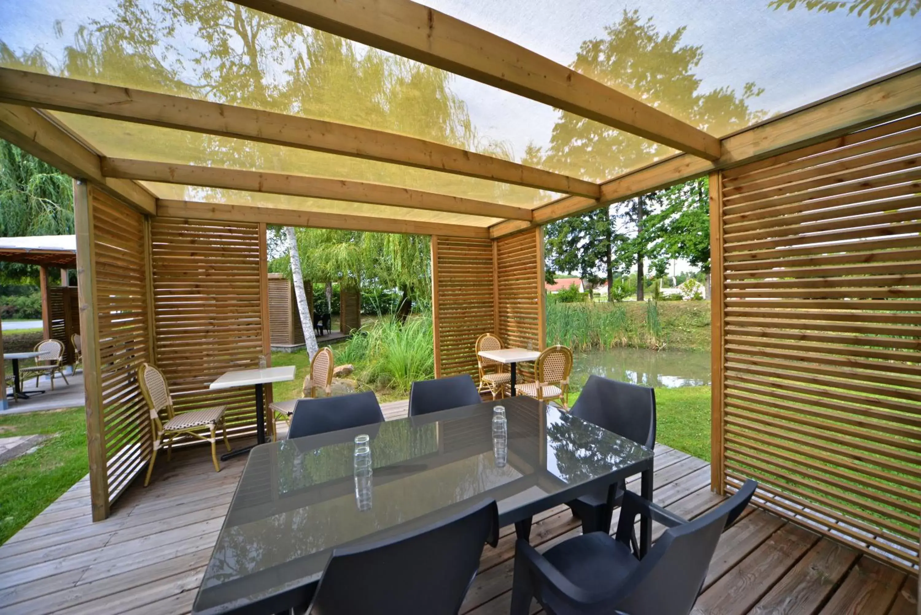 Patio in Logis - Hotel Restaurant La Mire