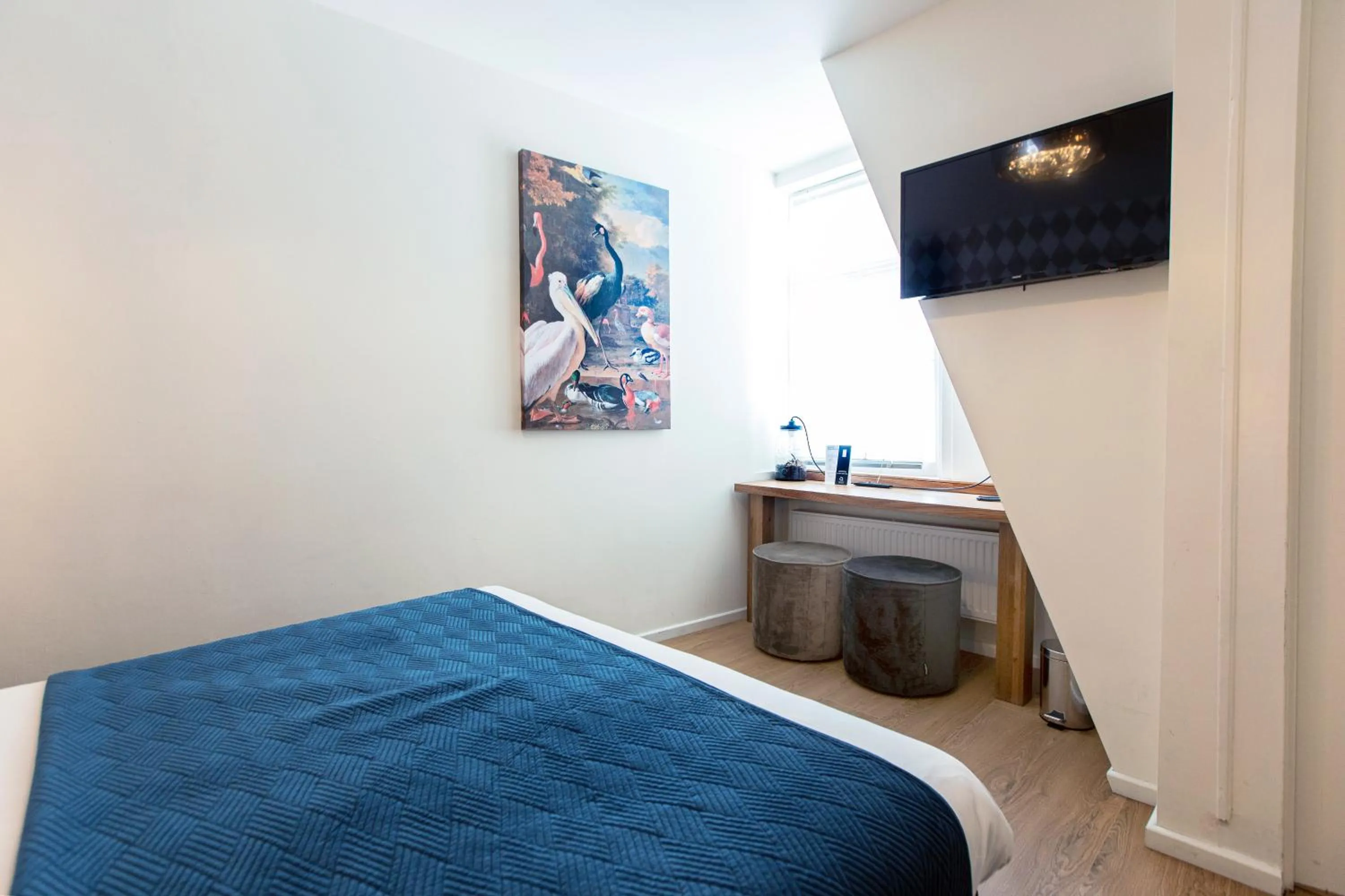 Bed in Quentin Golden Bear Hotel