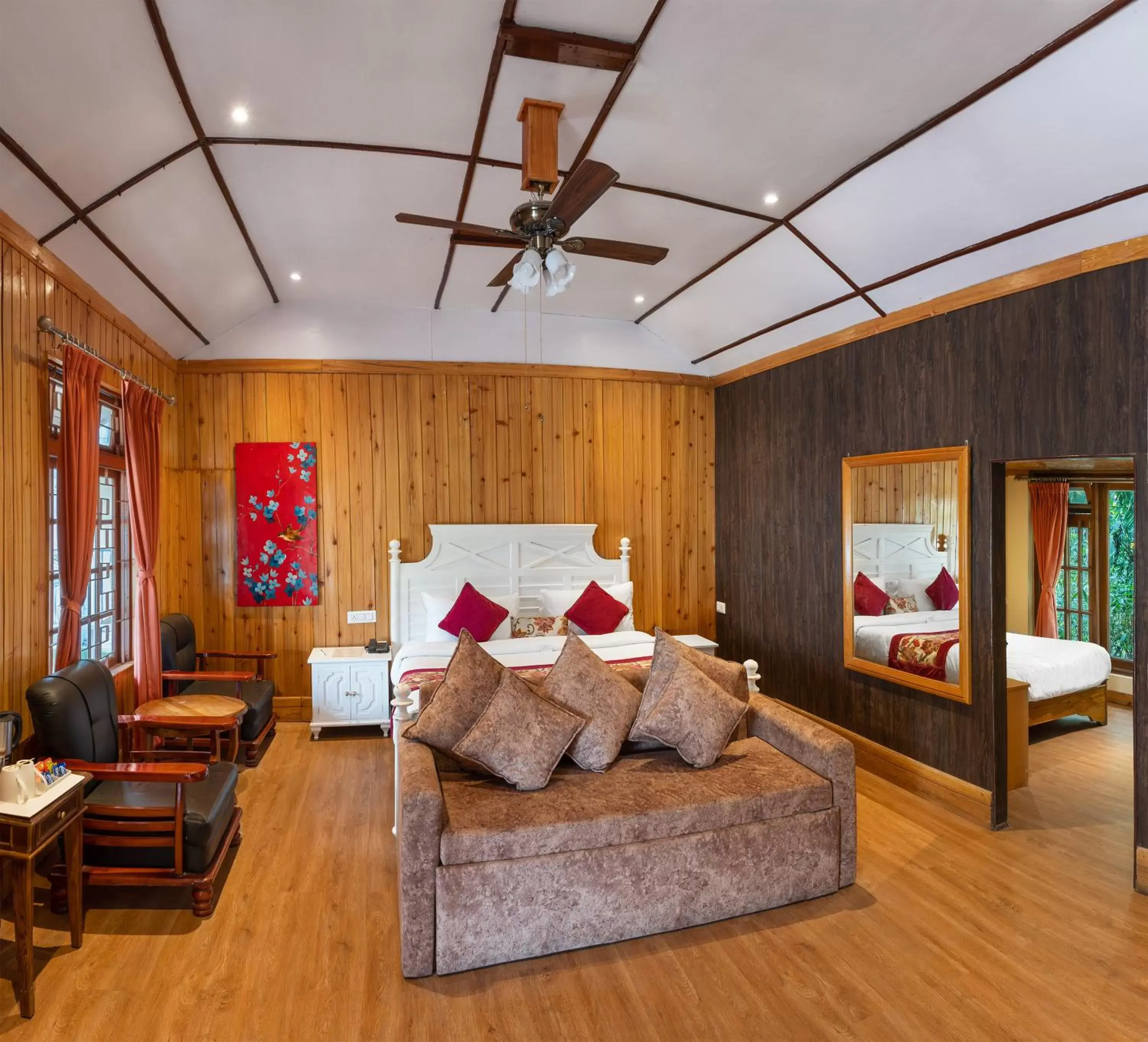 Bed, Seating Area in Summit Barsana Resort & Spa