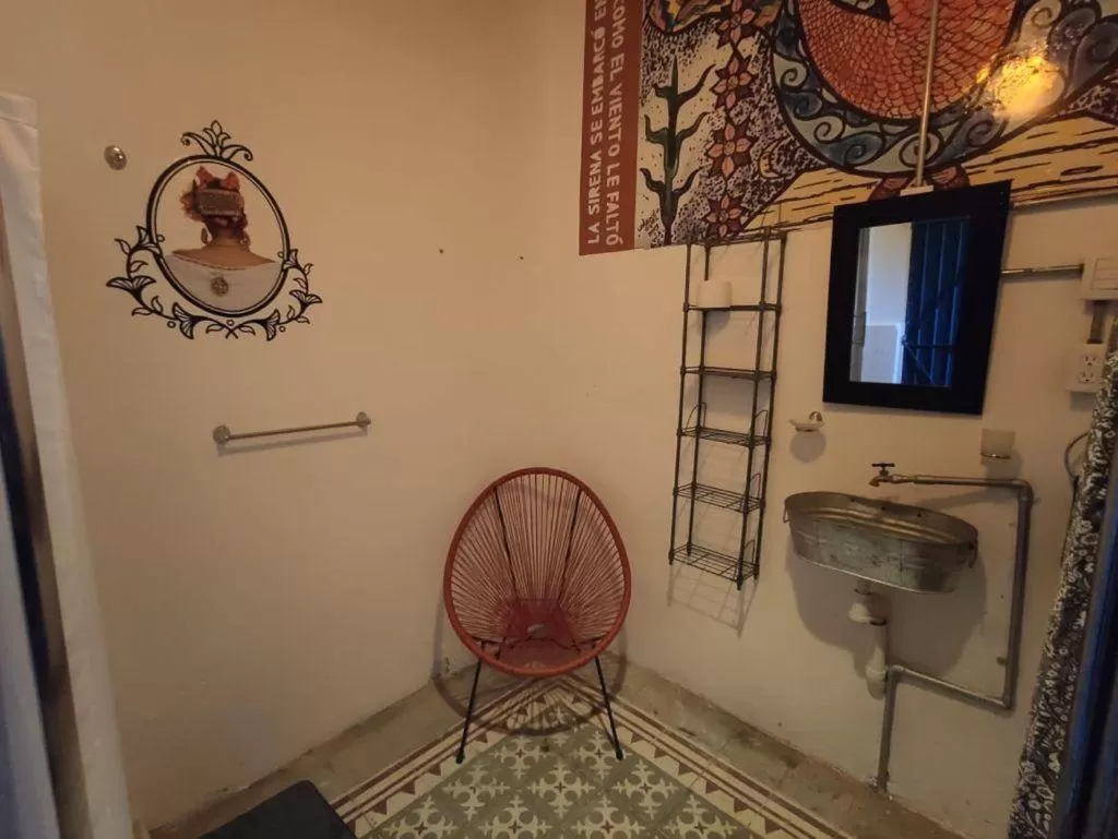 Bathroom, TV/Entertainment Center in Chuchumbé Hotel Cultural, Restaurante & Café