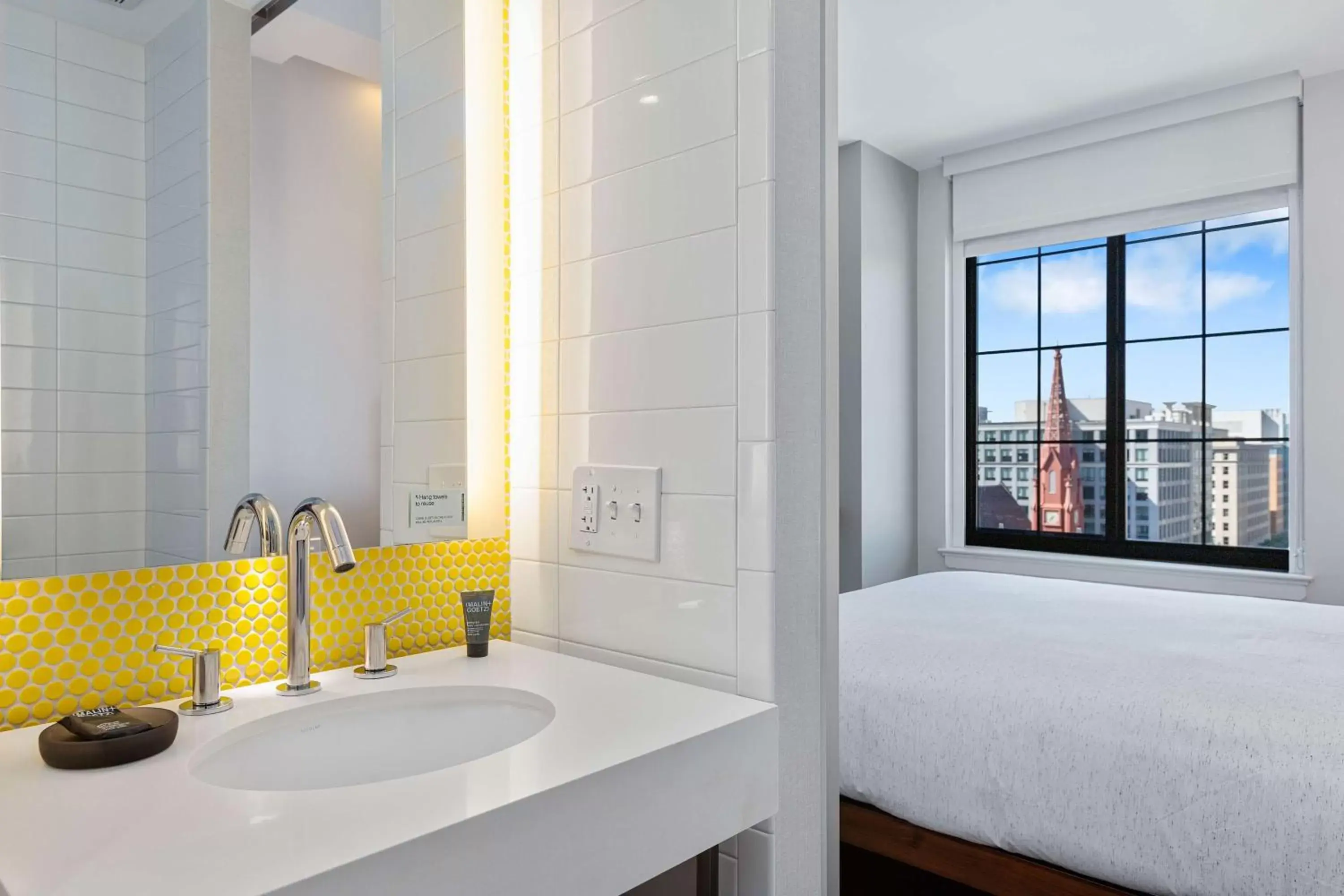 Bathroom, Bed in Motto by Hilton Washington DC City Center Bathroom, Bed in Motto by Hilton Washington DC City Center