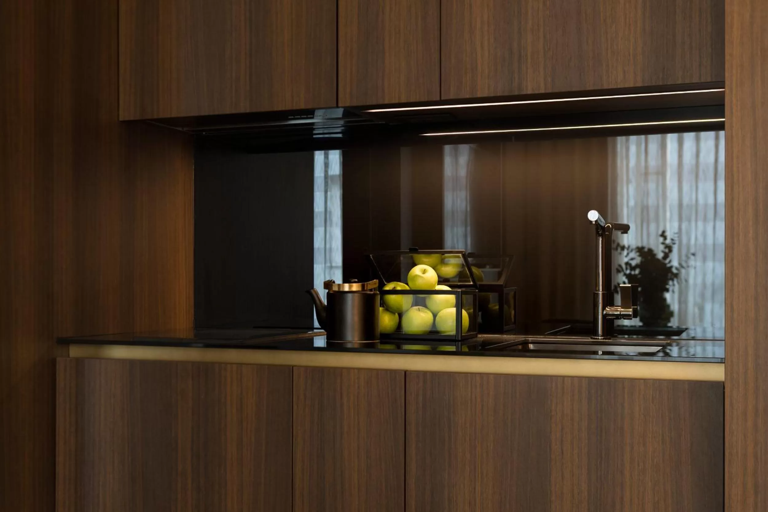 Kitchen or kitchenette in We Me Suite Hotel