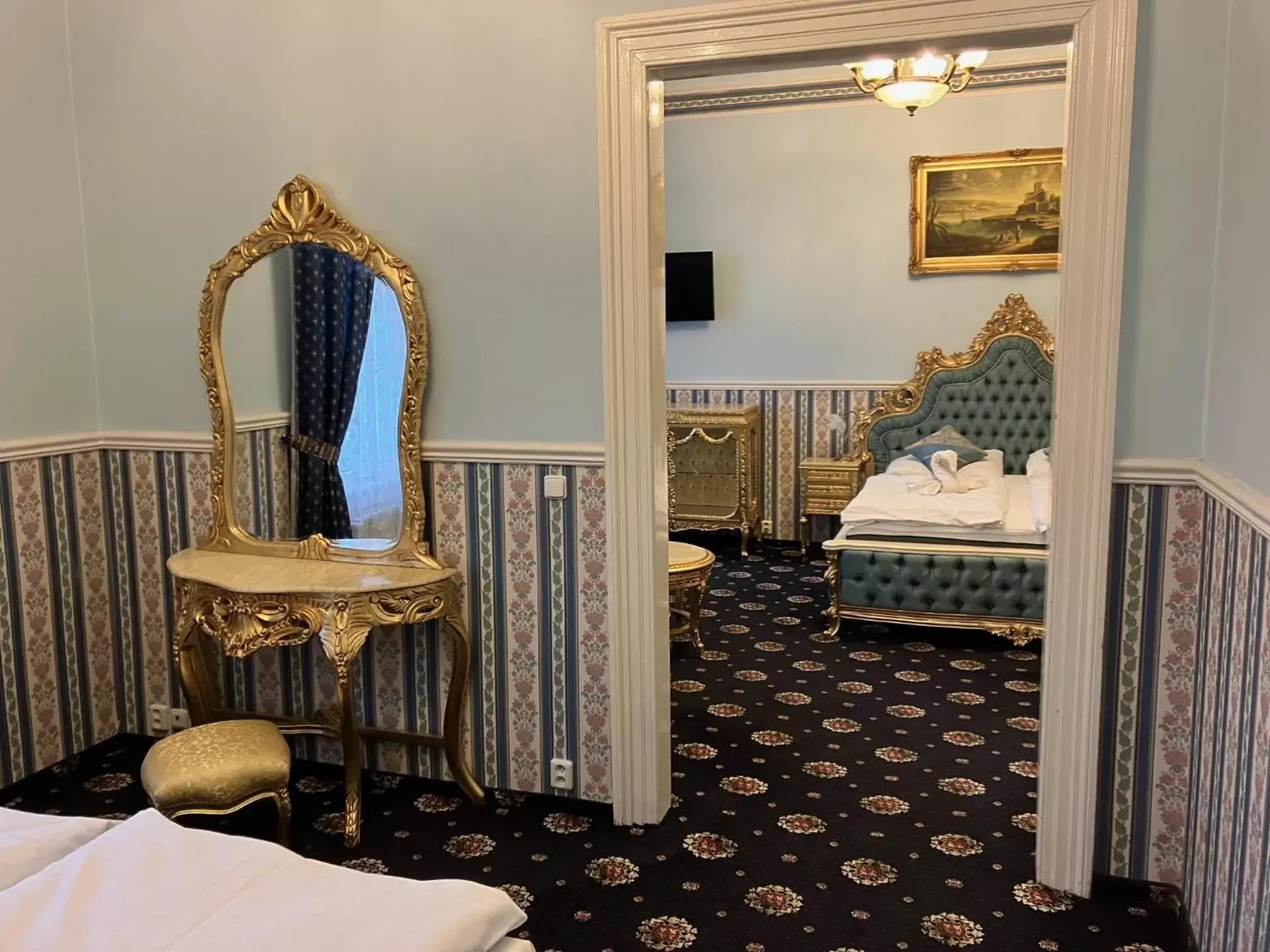 Bedroom, Seating Area in Hotel Klarinn Prague Castle