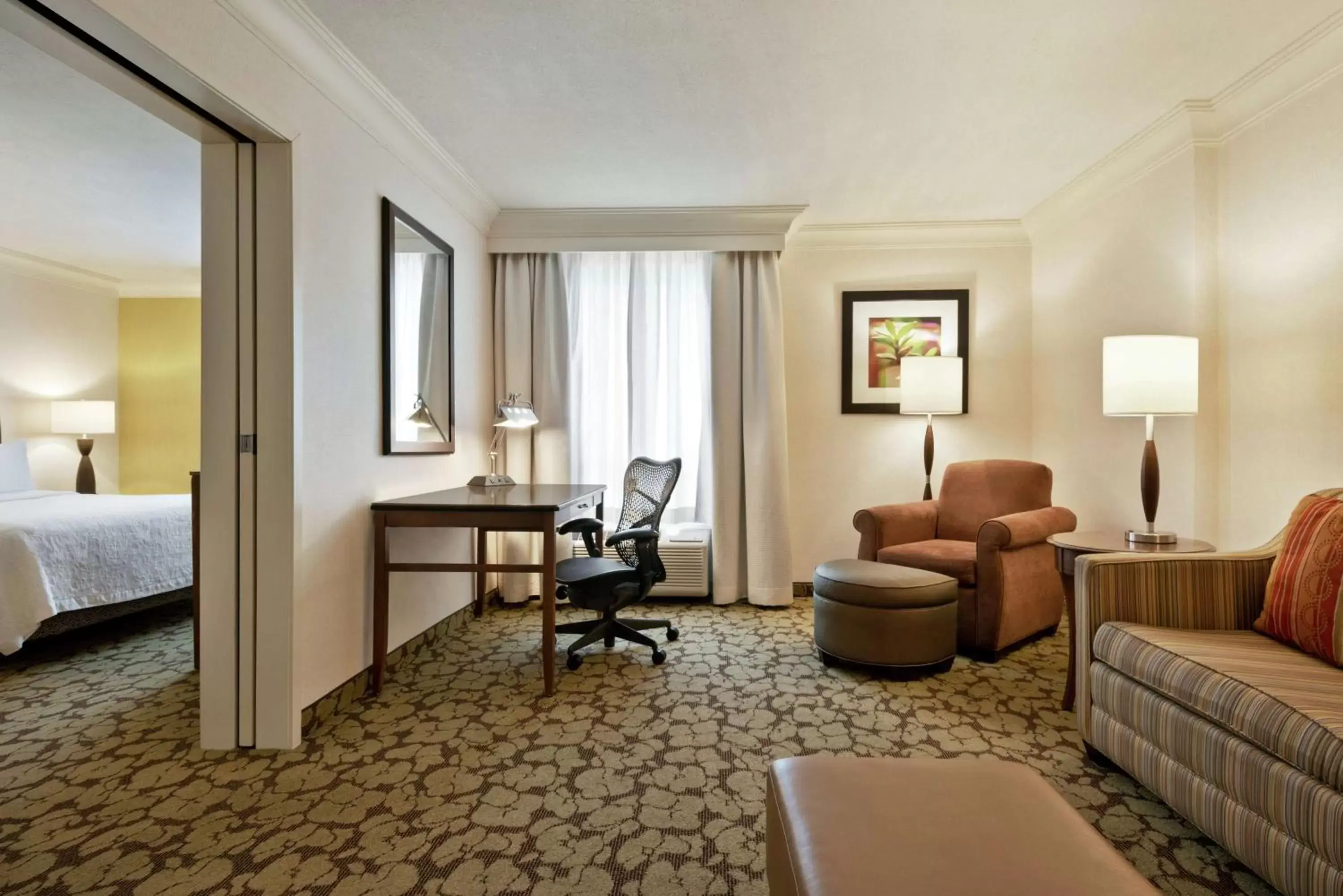 Bedroom, Seating Area in Hilton Garden Inn Saskatoon Downtown