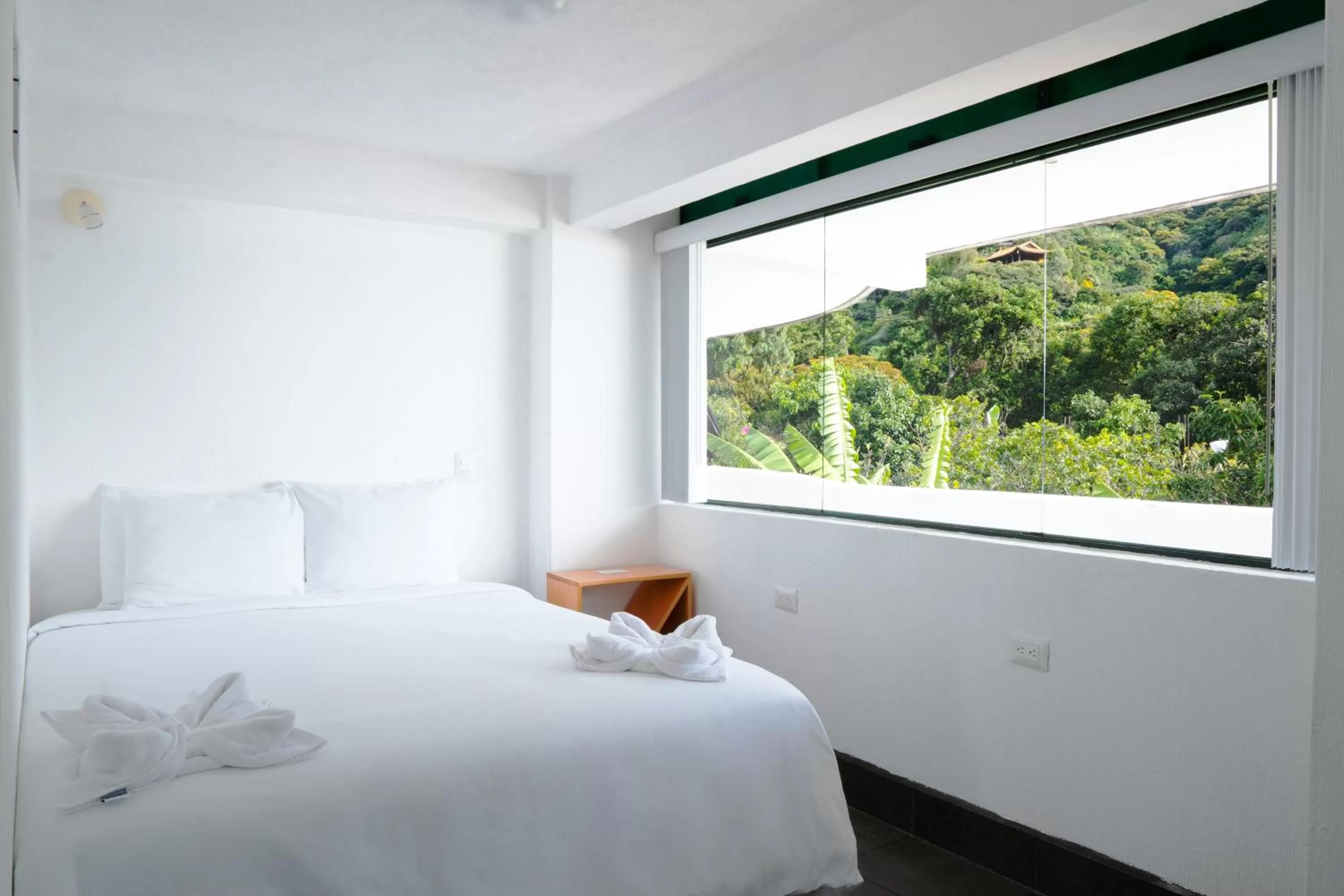 Bed in El Dragon Hotel