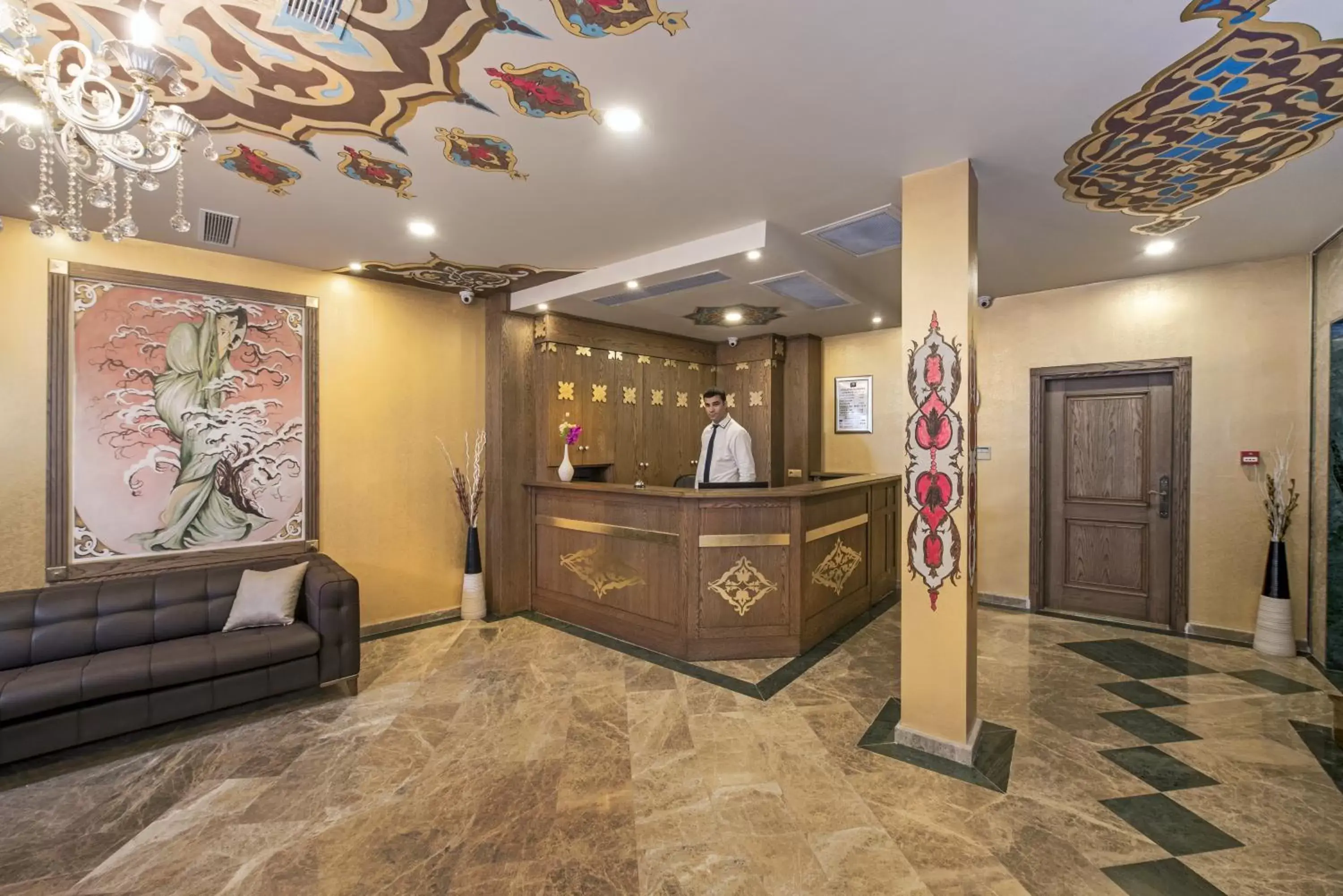 Communal lounge/ TV room, Lobby/Reception in Perapolis Hotel