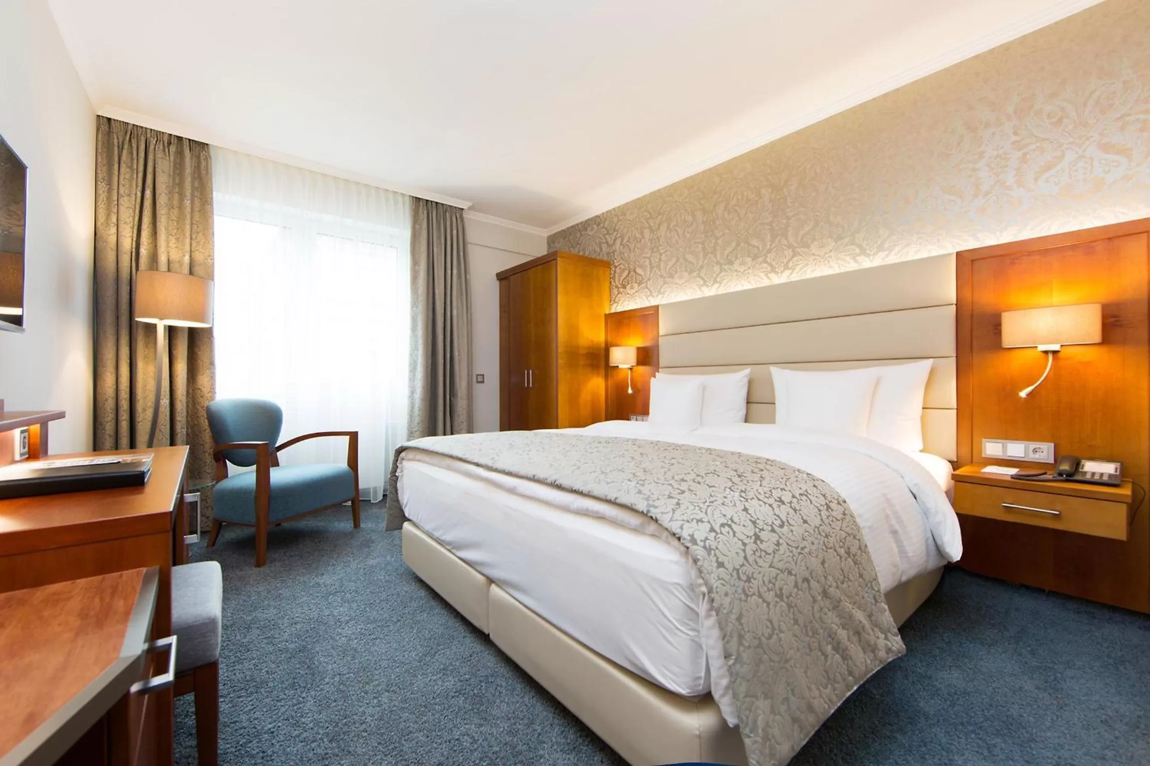 Photo of the whole room, Bed in Hotel Oranien Wiesbaden