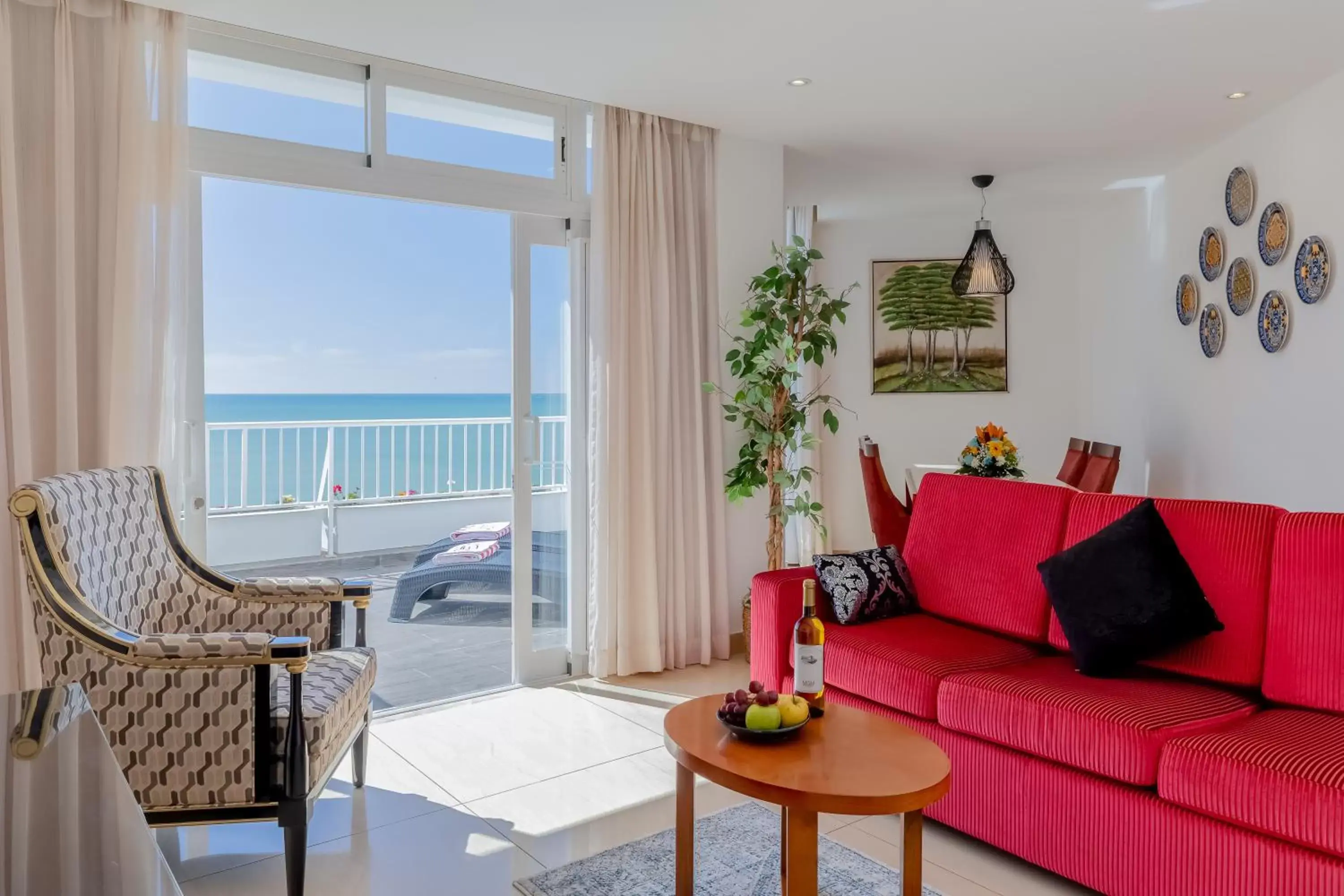 Bedroom, Seating Area in Monicca Collection Suites and Residences