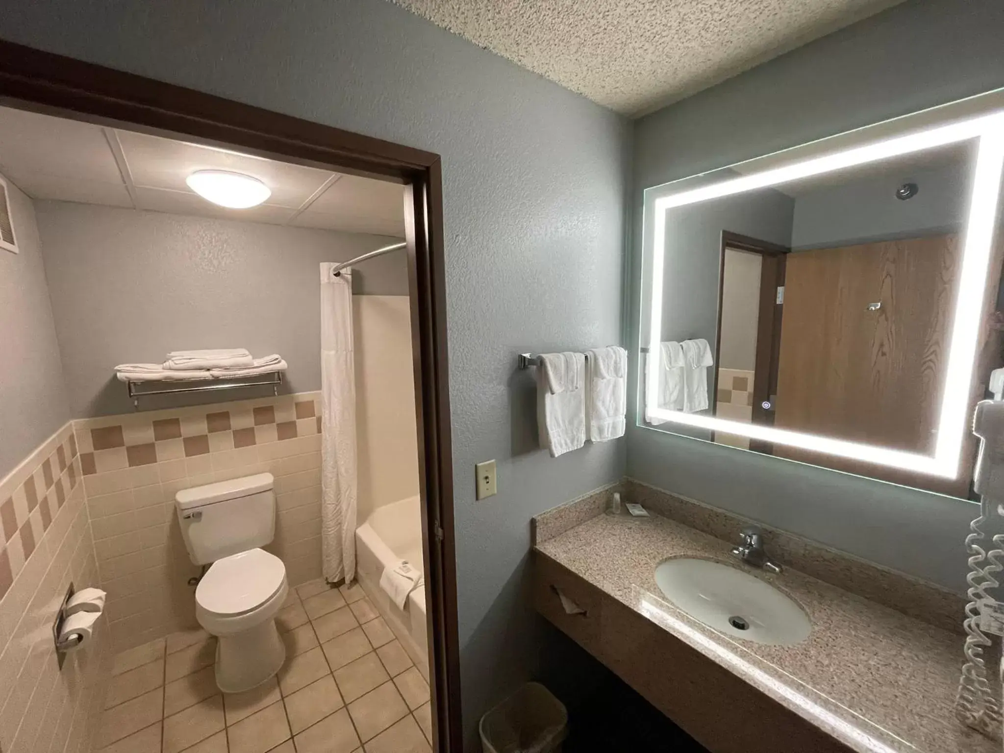 Bathroom in AmericInn by Wyndham Sayre