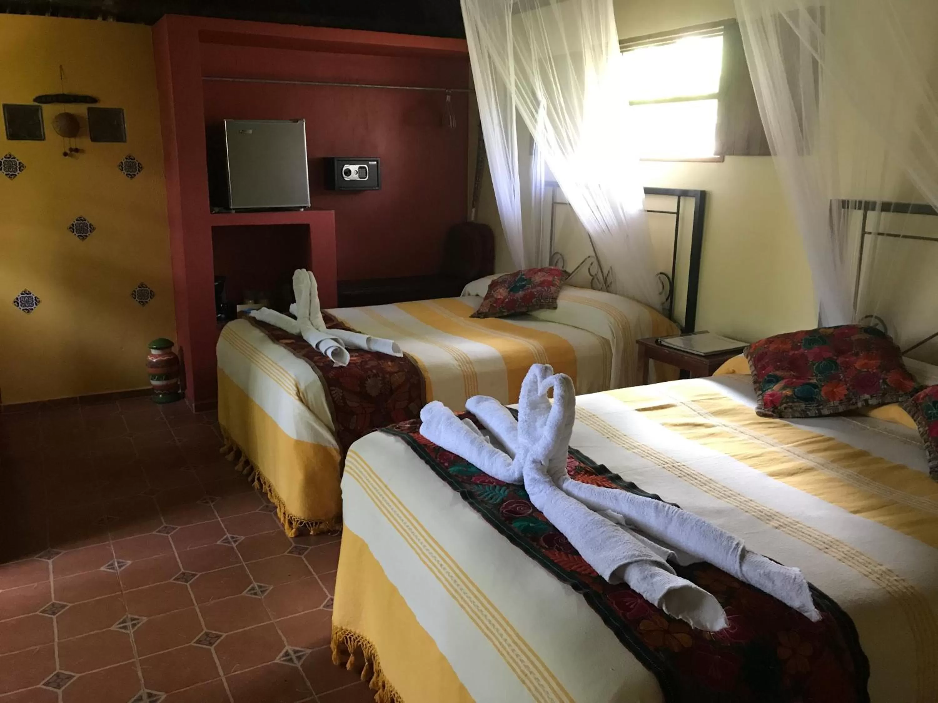 Bed in The Pickled Onion Eco-Boutique B&B