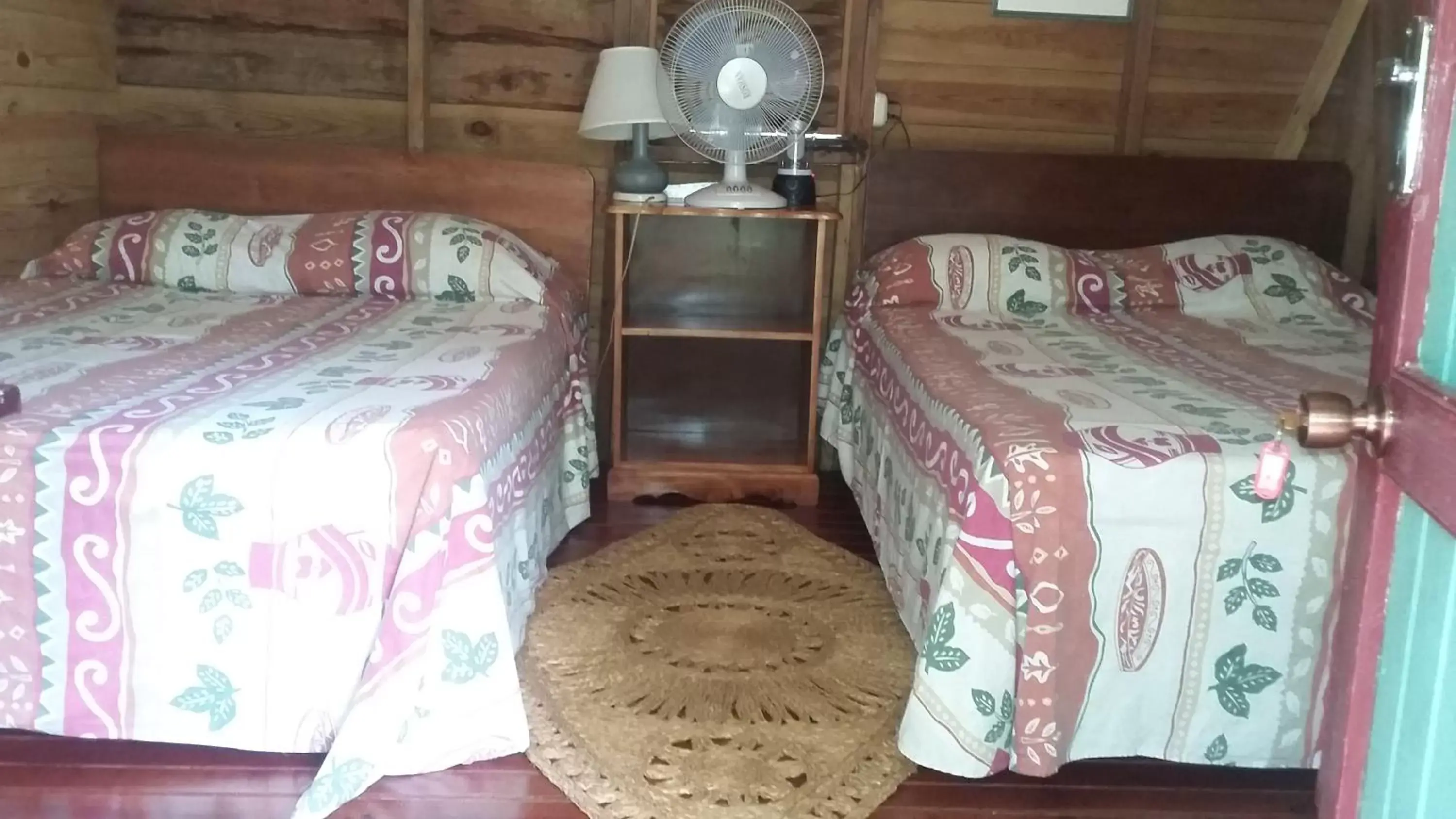 Bed in Secret Cabins at Firefly Beach Cottage
