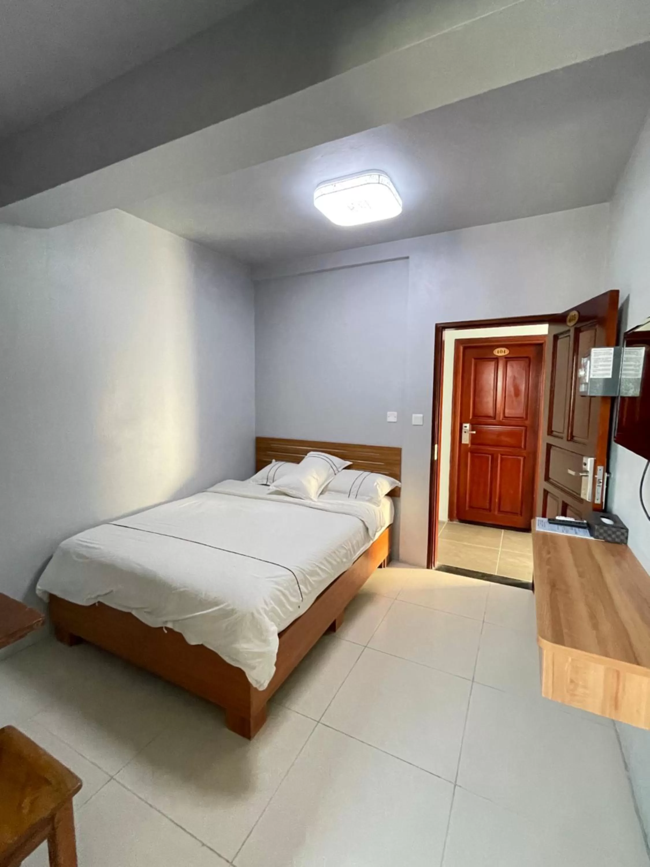 Bed in Caye Caulker Beach Hotel