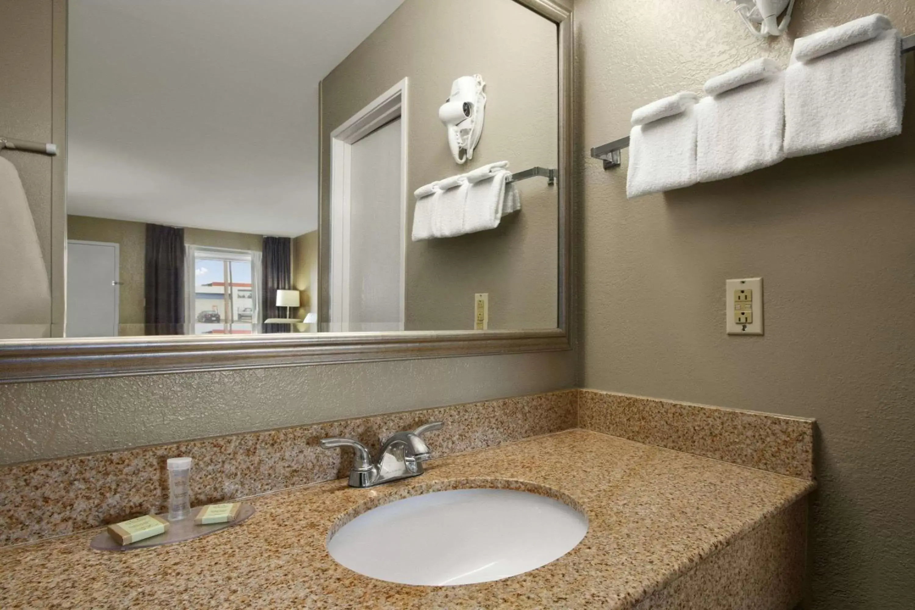 Bathroom in Super 8 by Wyndham-Tupelo Airport