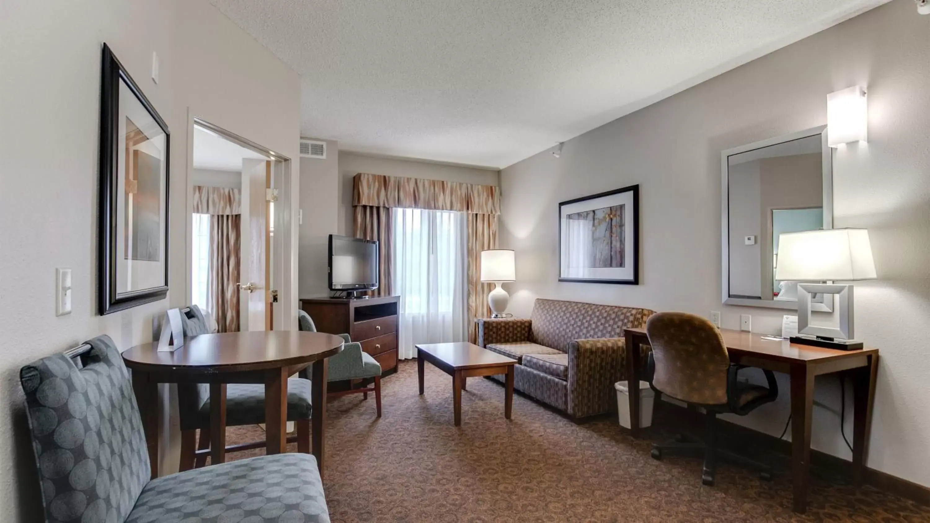 Photo of the whole room, Seating Area in Holiday Inn Express and Suites St. Cloud, an IHG Hotel