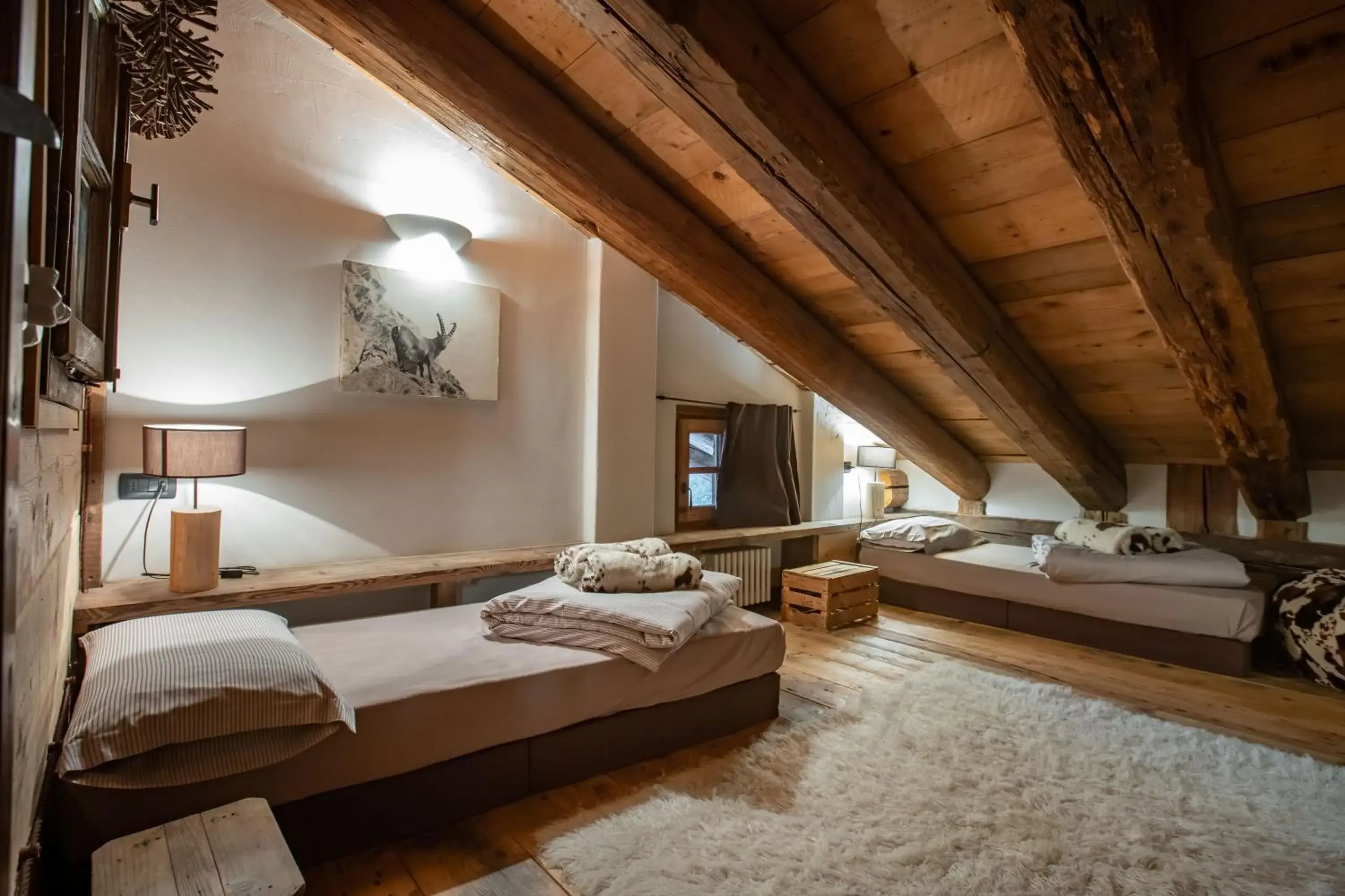 Bed in Hotel Chalet Svizzero