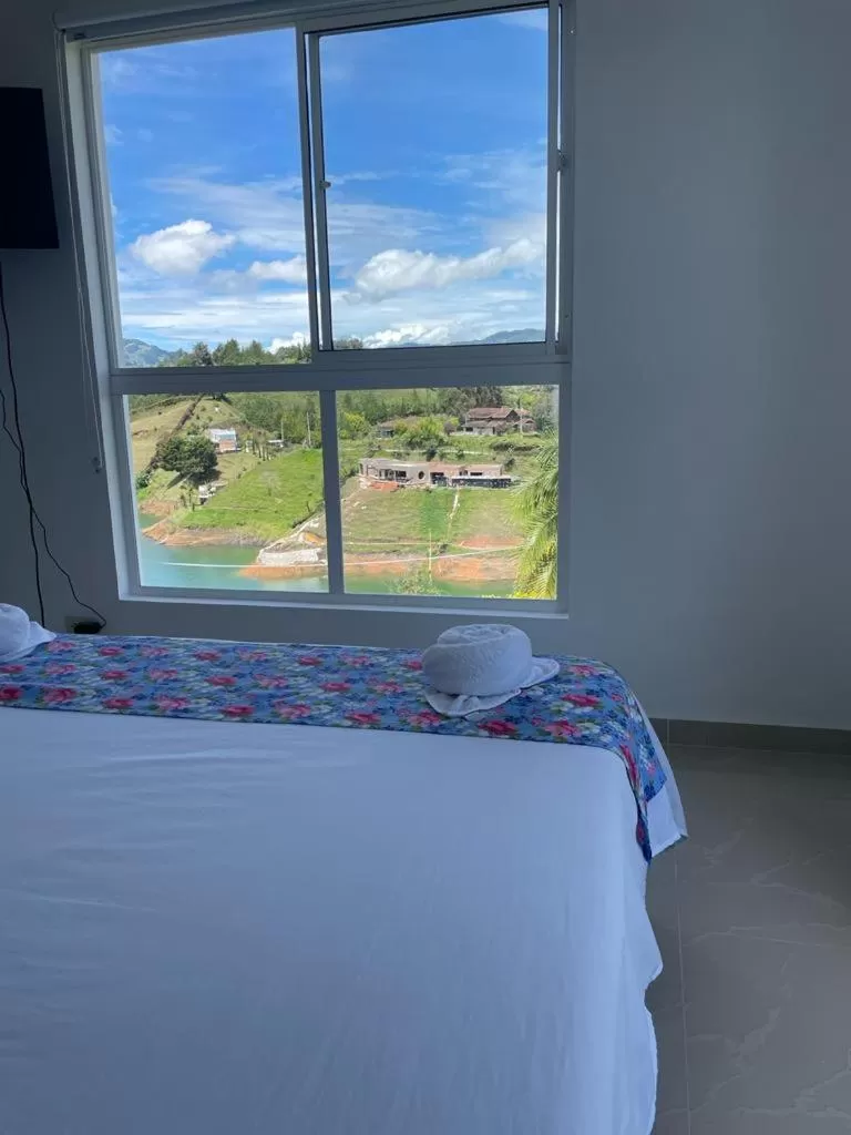 Bed in Paradise Lake Finca Hotel