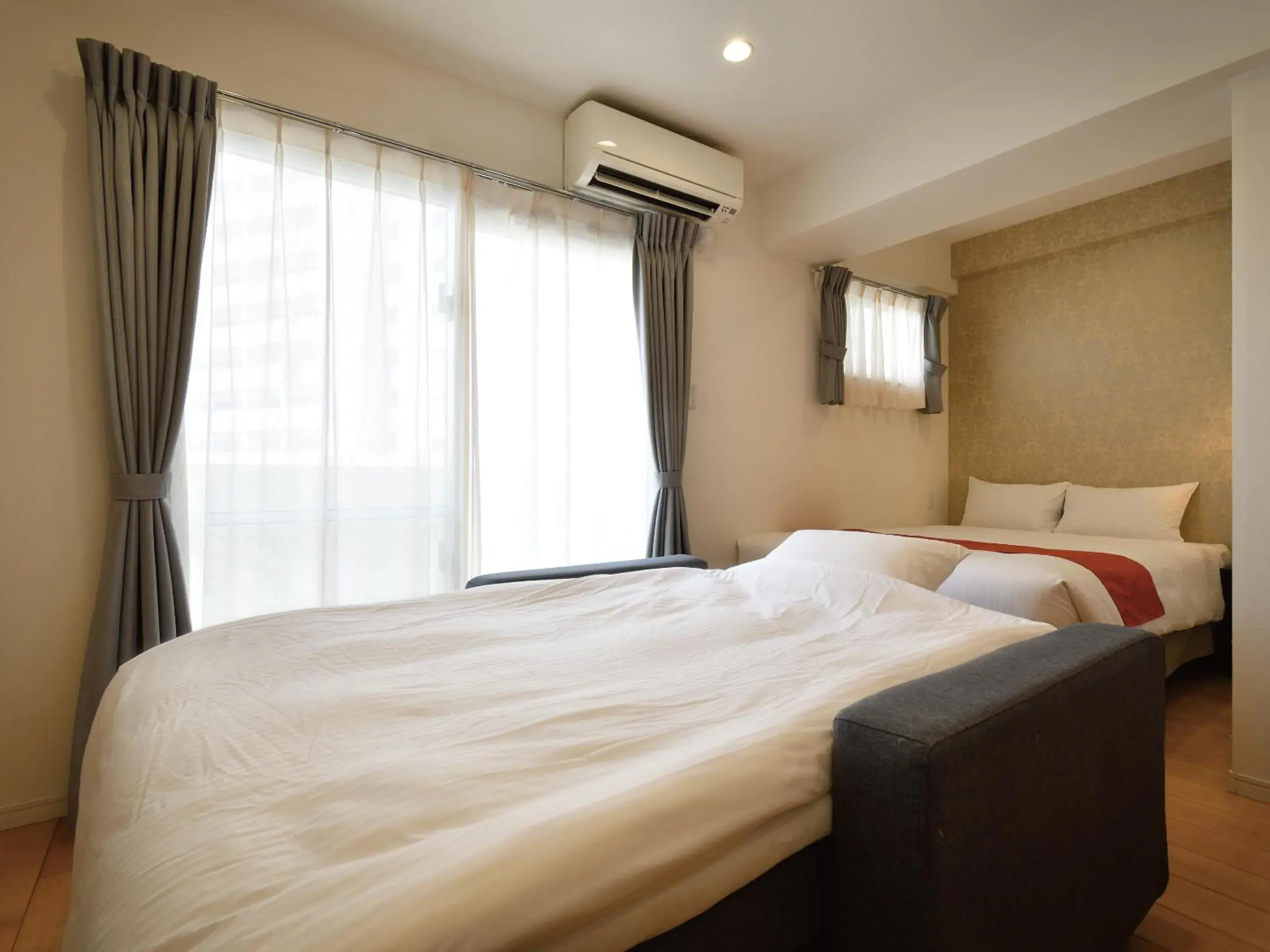 Bed in Condominium L's INN Bed in Condominium L's INN