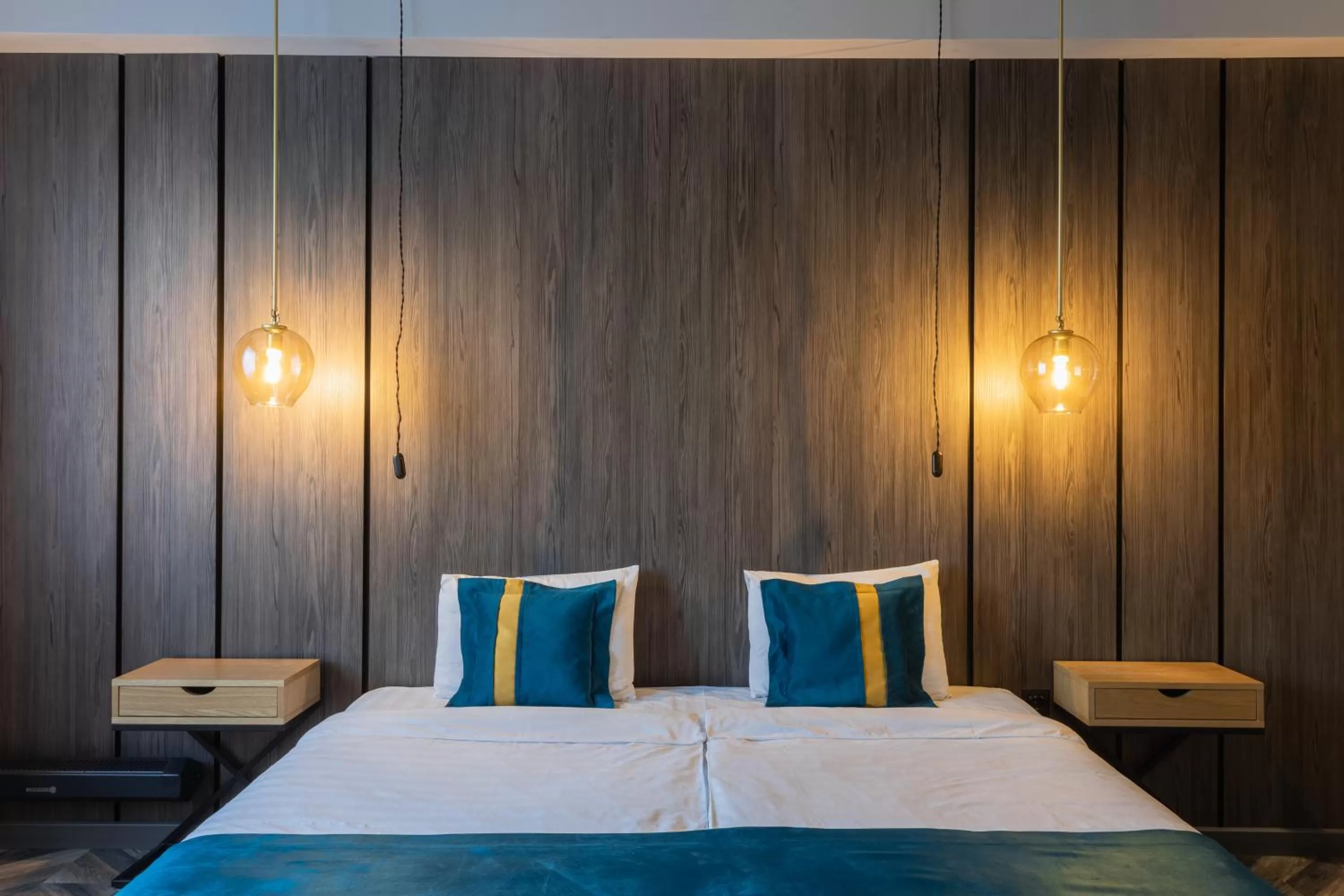 Bed in Tulip Residence & Spa Hotel