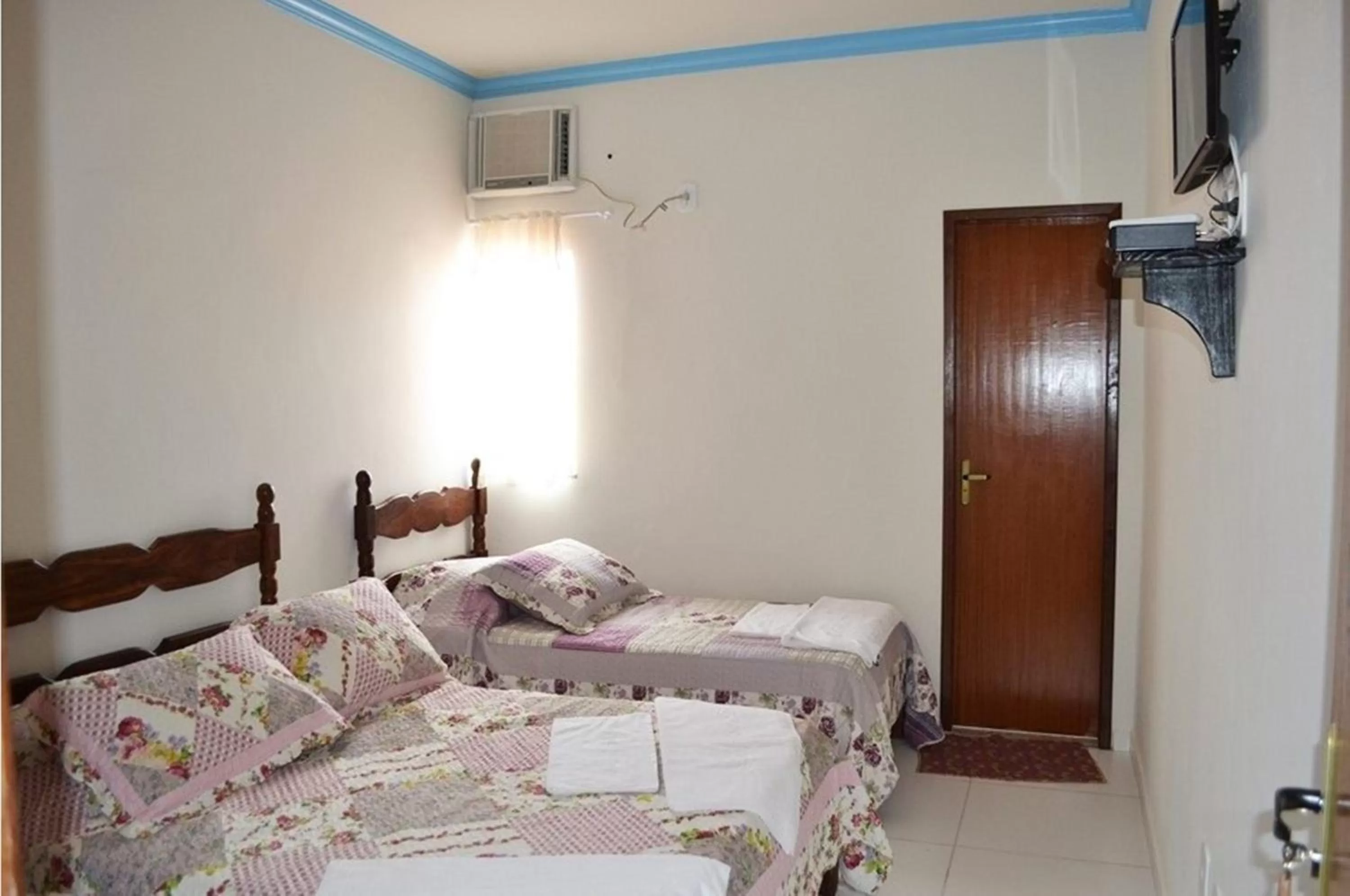 Bed in Pousada Miosotis