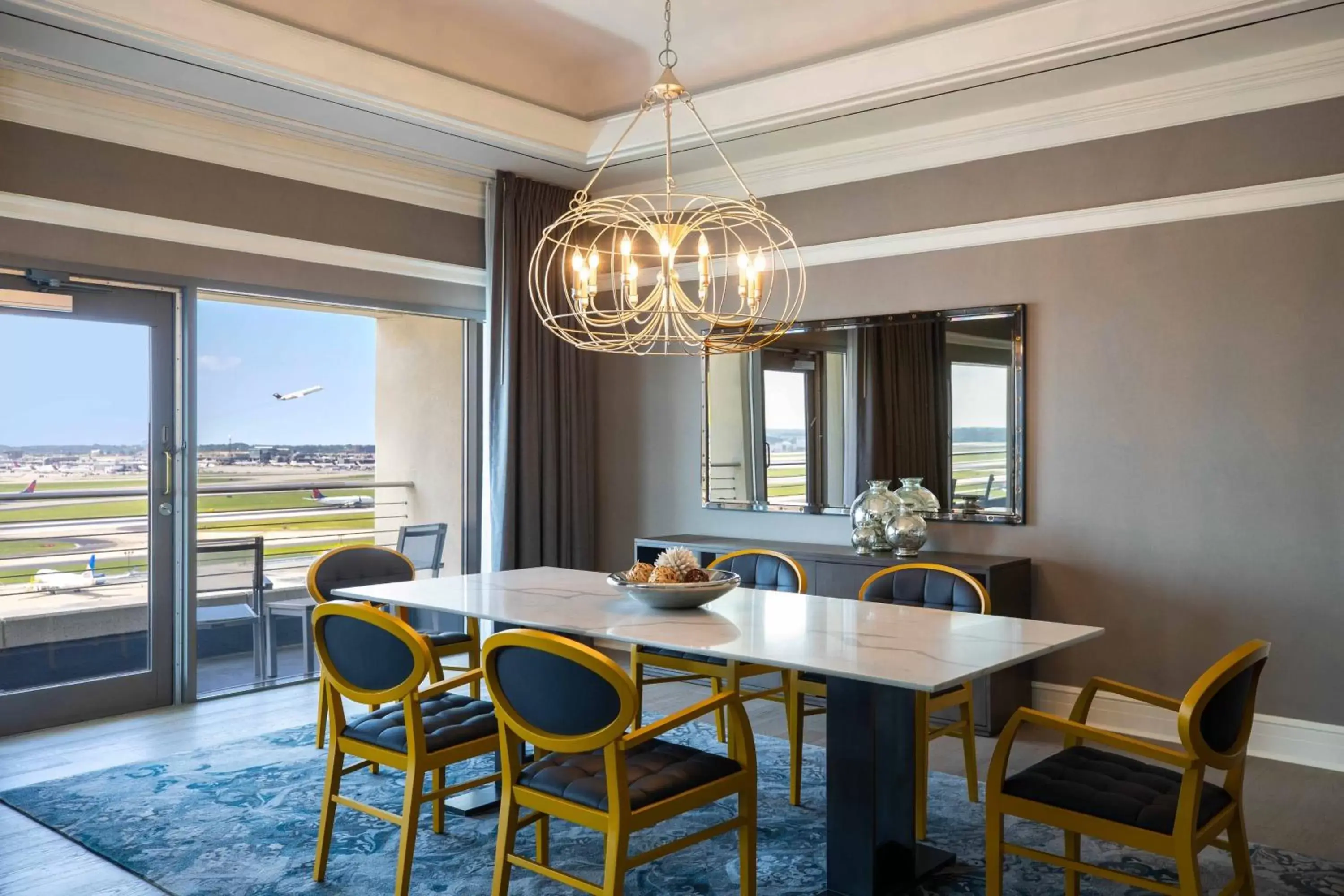 Bedroom, Dining Area in Renaissance Concourse Atlanta Airport Hotel