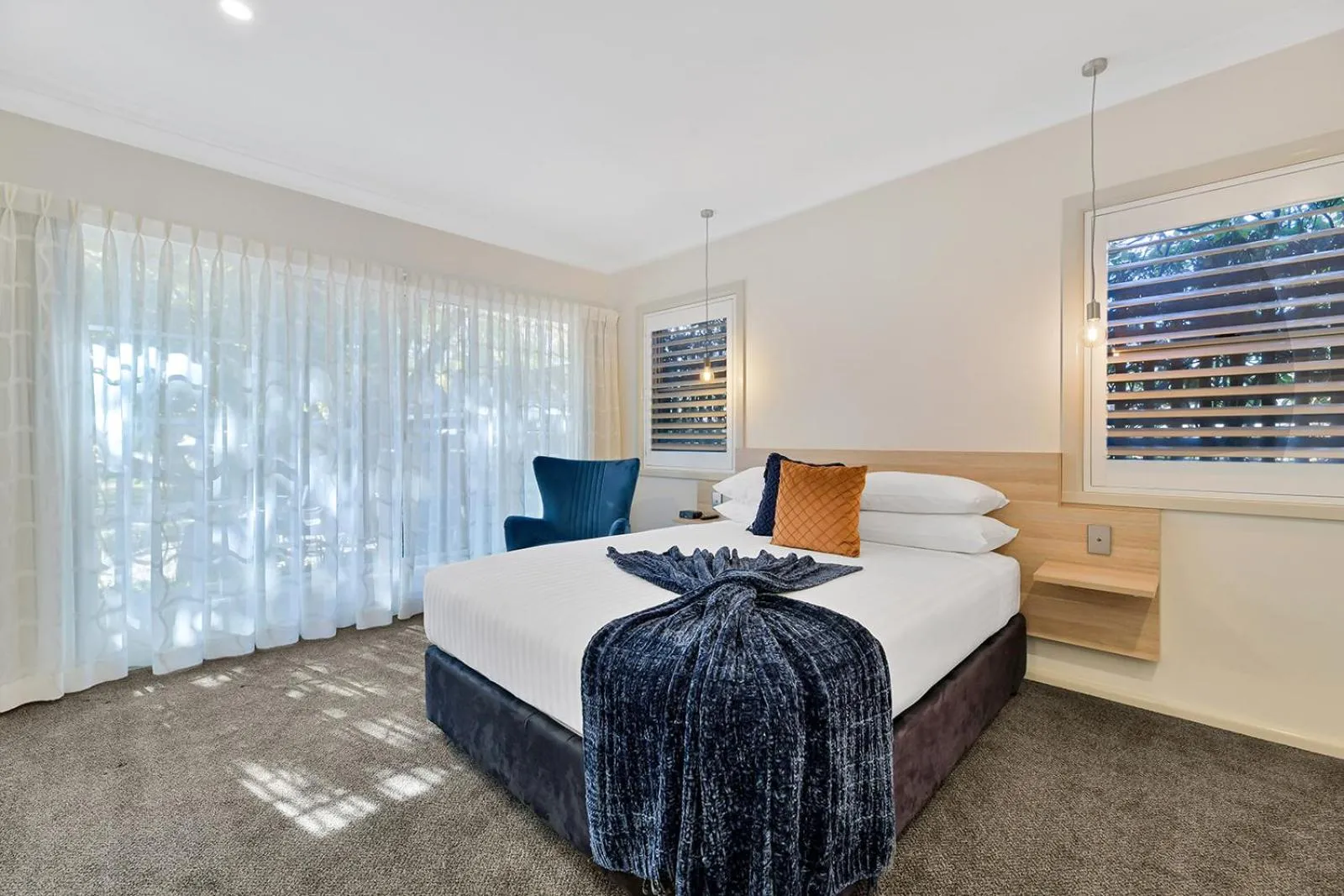 Bed in Central Caleula Motor Lodge