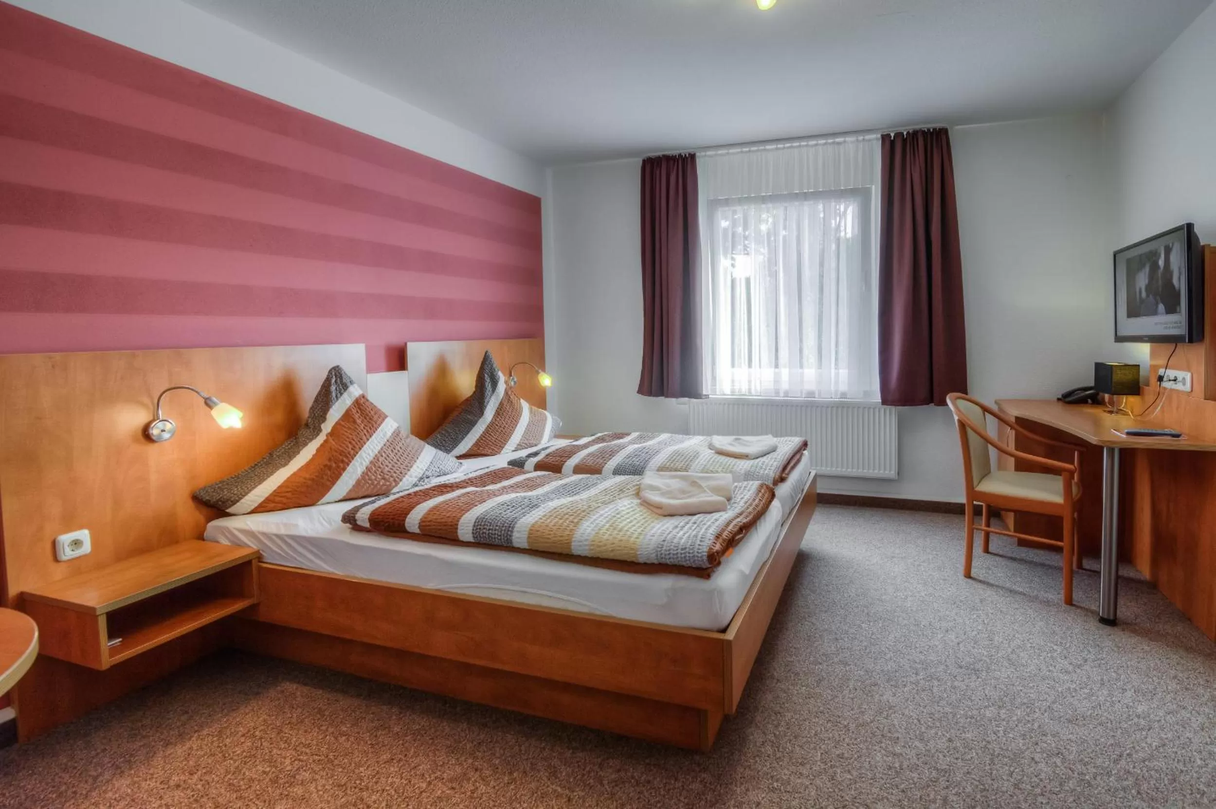 Photo of the whole room, Bed in Landhotel & Brauhaus Prignitzer Hof