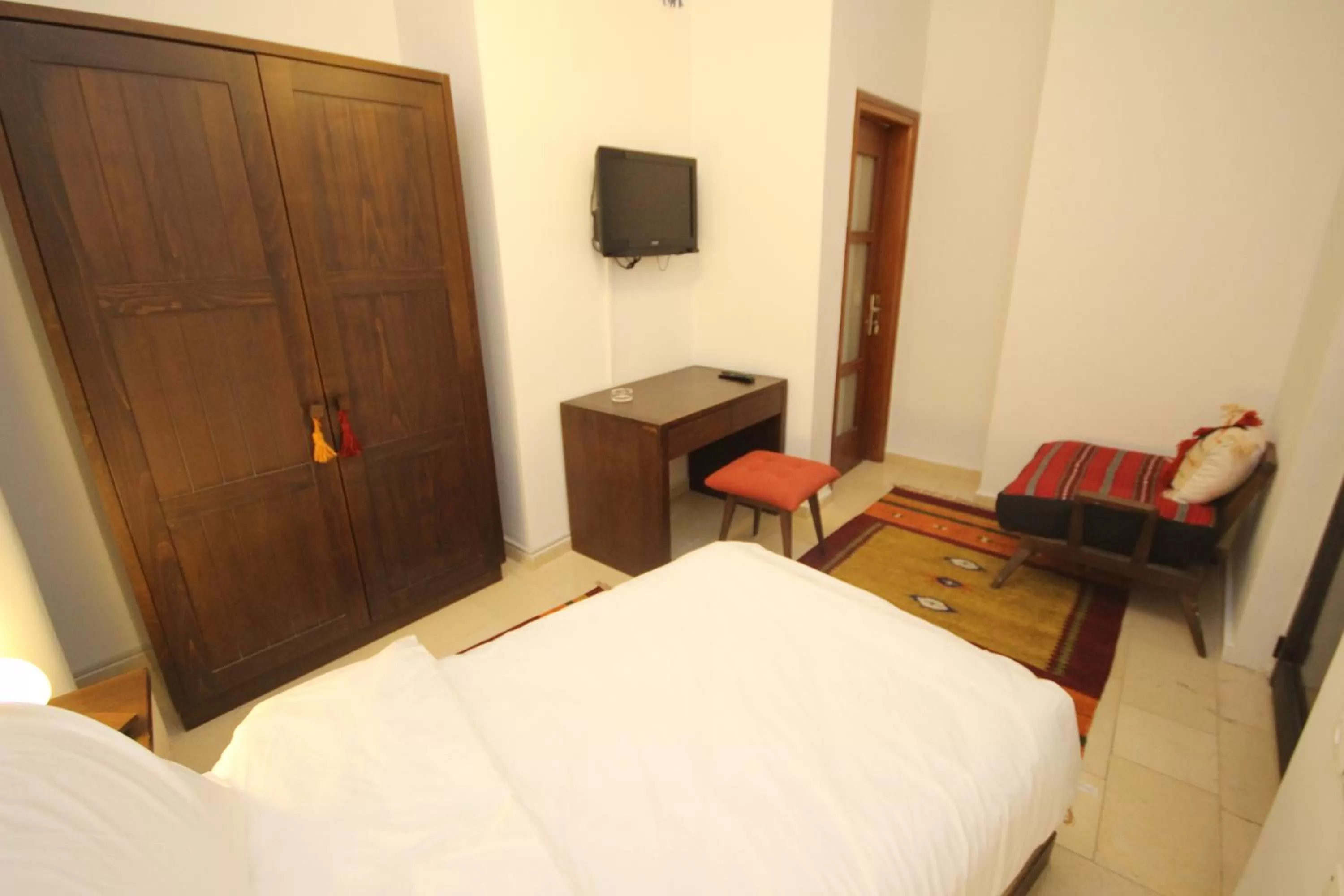 Bed in Khan Alwakala Hotel