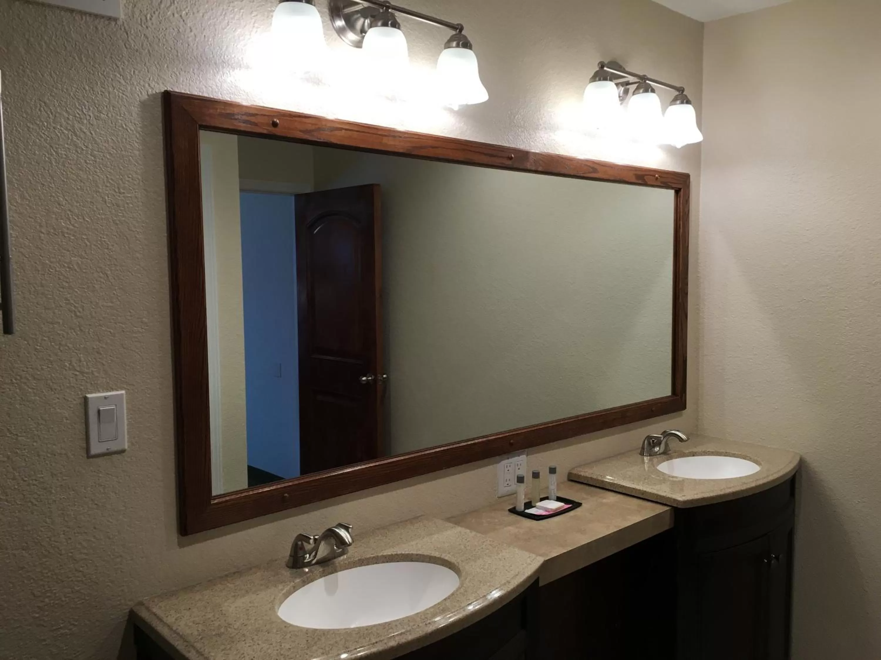 Bathroom in Ramada by Wyndham Elko Hotel at Stockmen's Casino