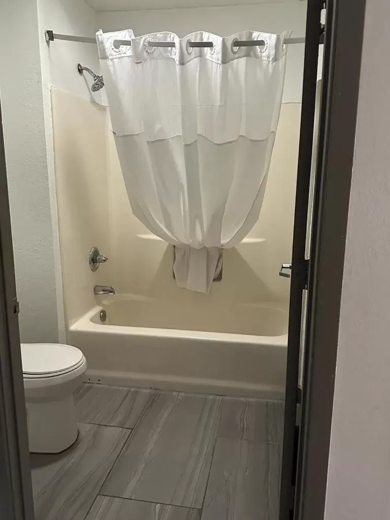 Bathroom in Days Inn by Wyndham Decatur Priceville I-65 Exit 334