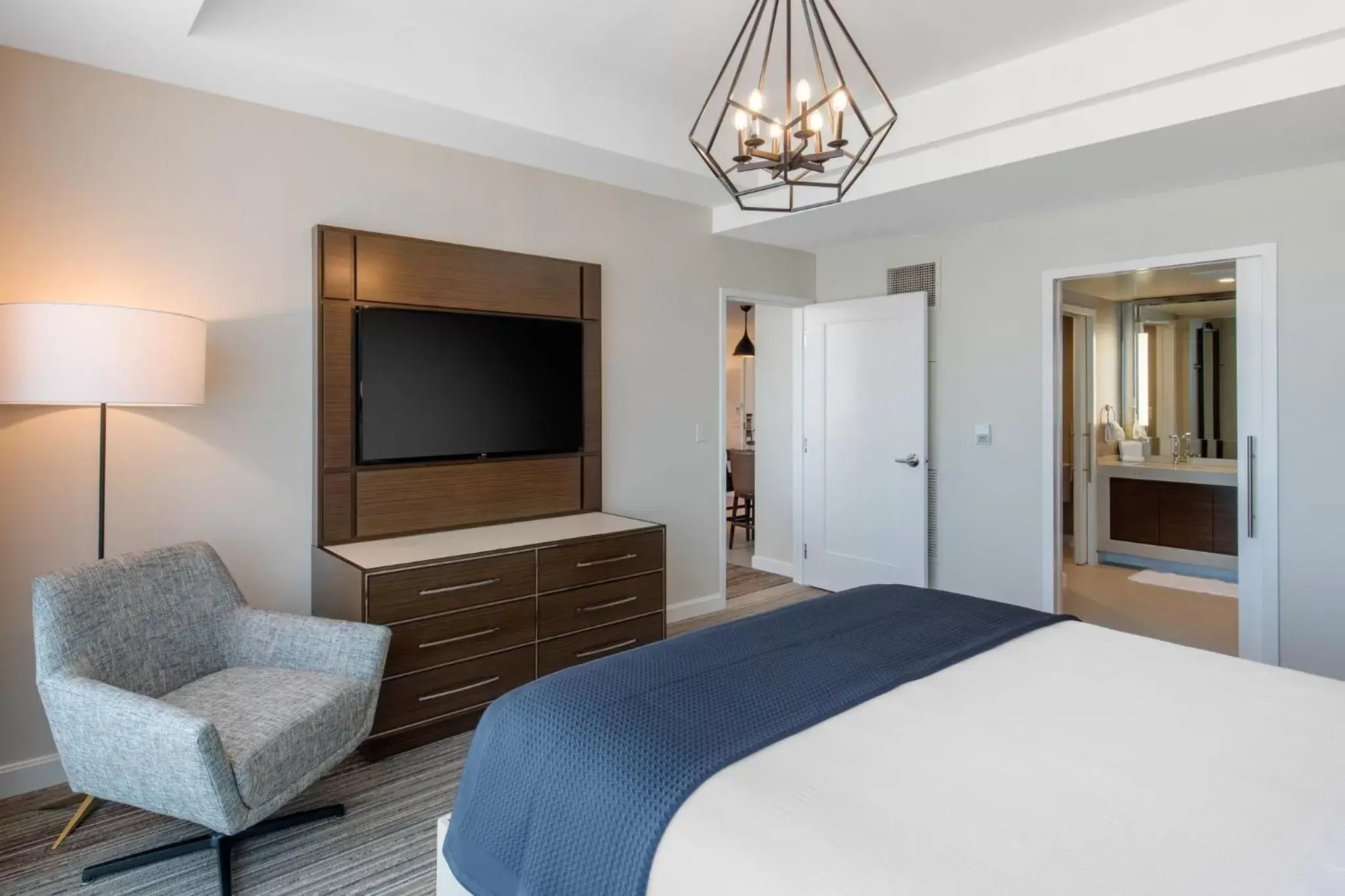 Bedroom, TV/Entertainment Center in Omni Frisco at The Star