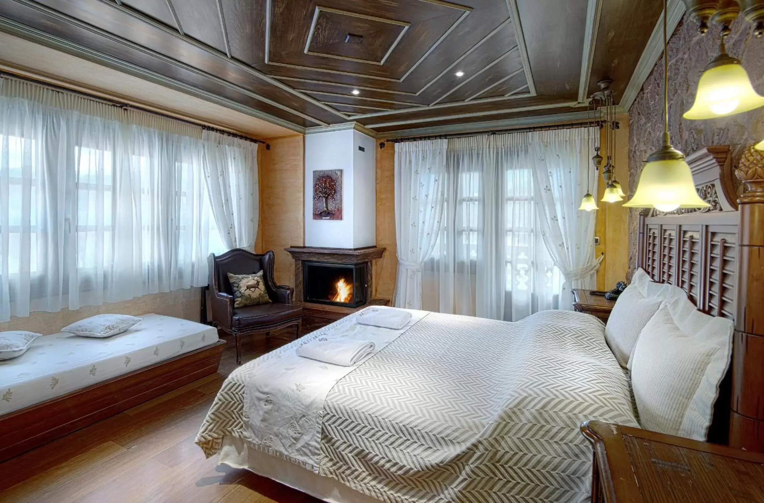 Deluxe Family Room with Fireplace and Mountain View in AROMA DRYOS SPA & ECO Hotel Deluxe Family Room with Fireplace and Mountain View in AROMA DRYOS SPA & ECO Hotel