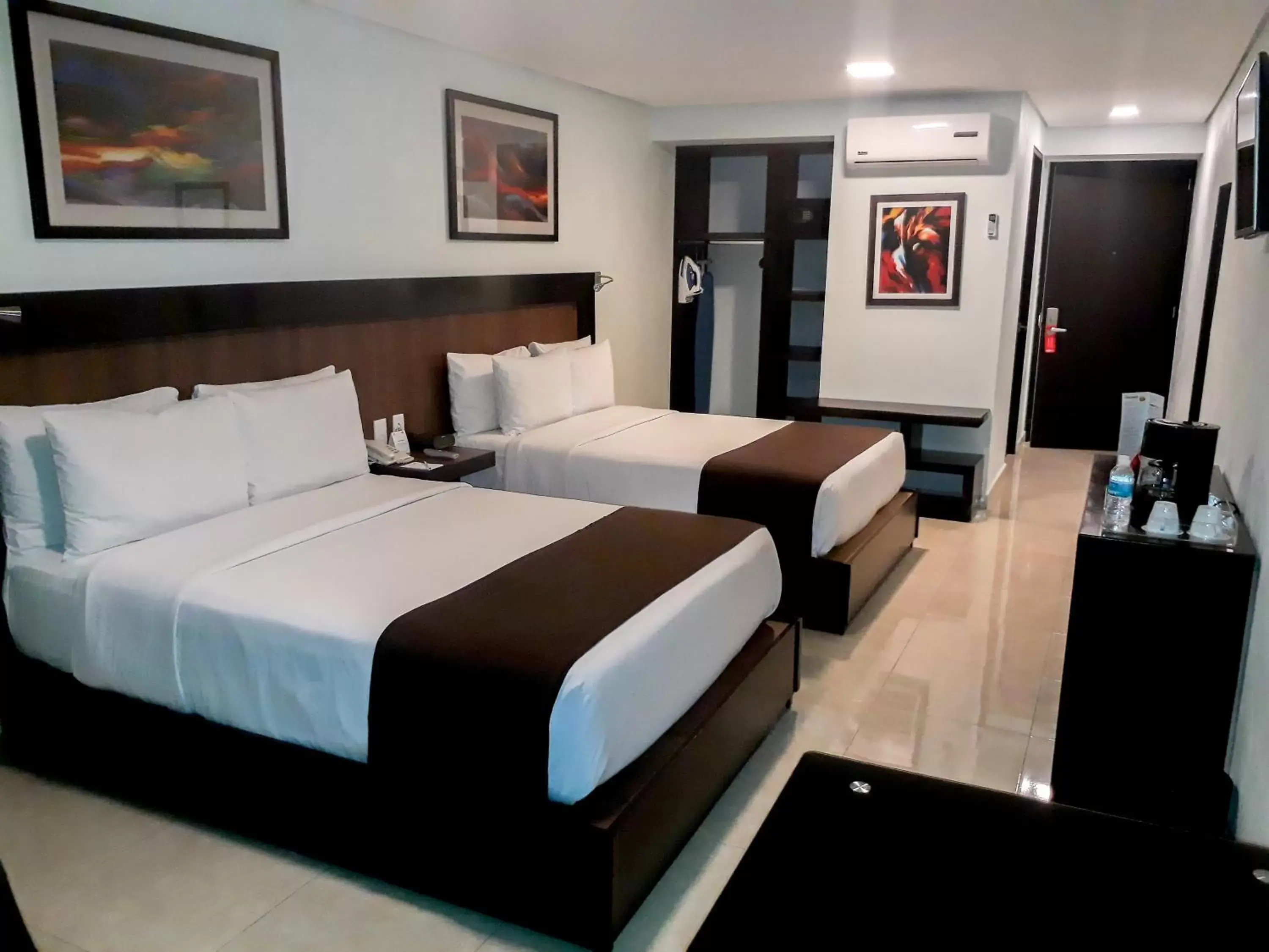 Bedroom in Hotel & Suites PF