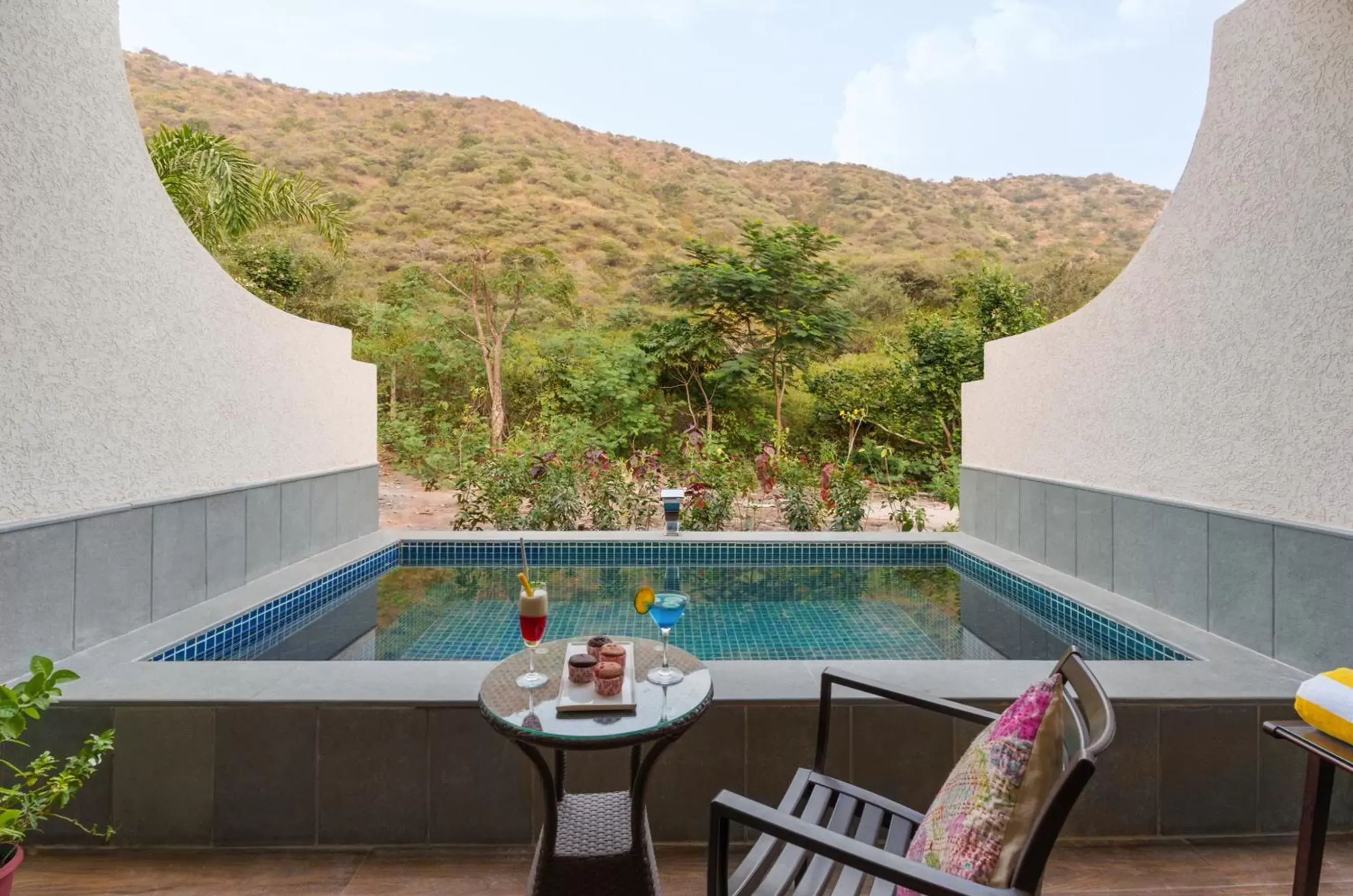 Patio, Swimming Pool in Anandam - A Luxury Resort in Udaipur