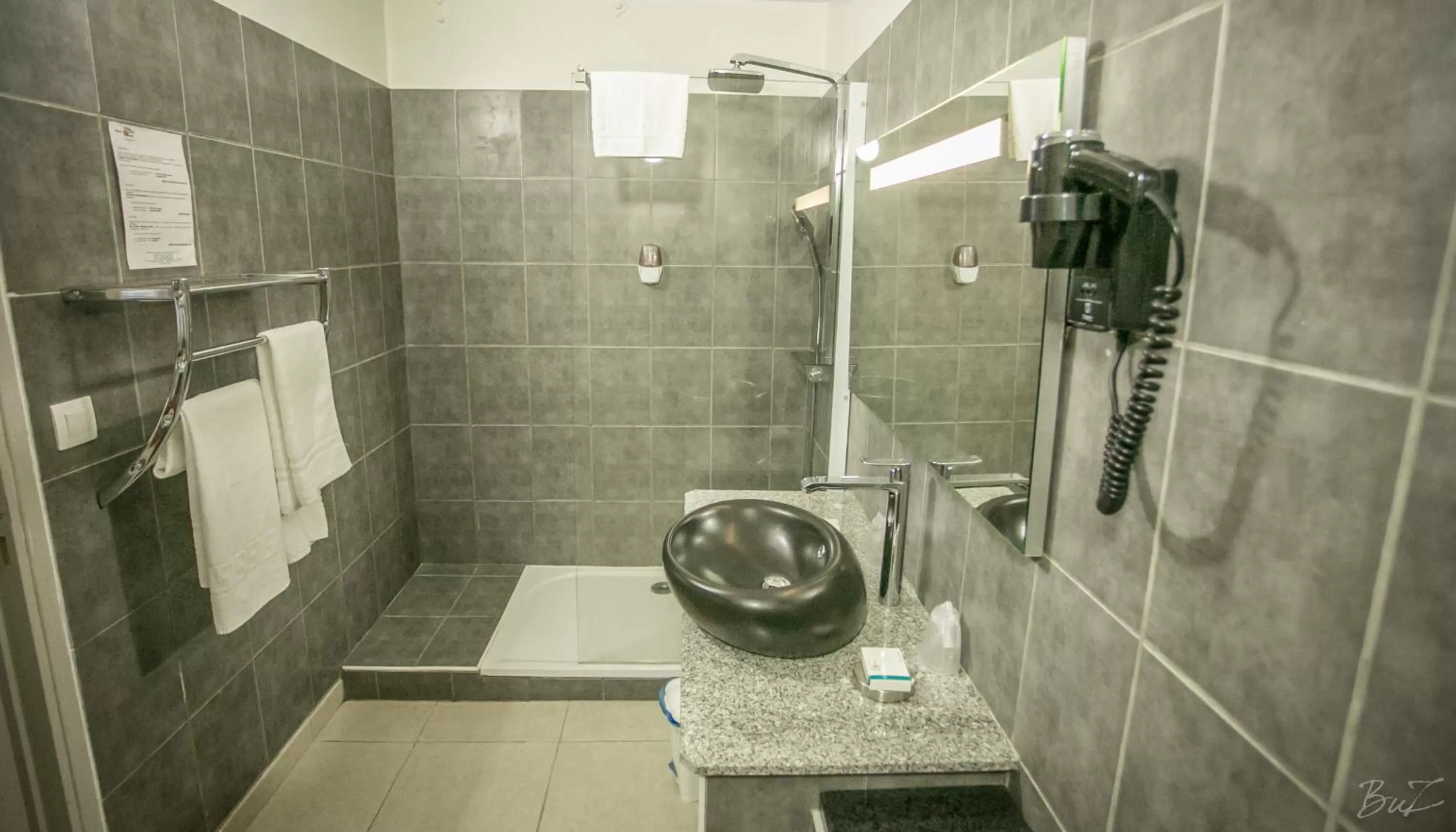 Bathroom in Hotel Village Soleil