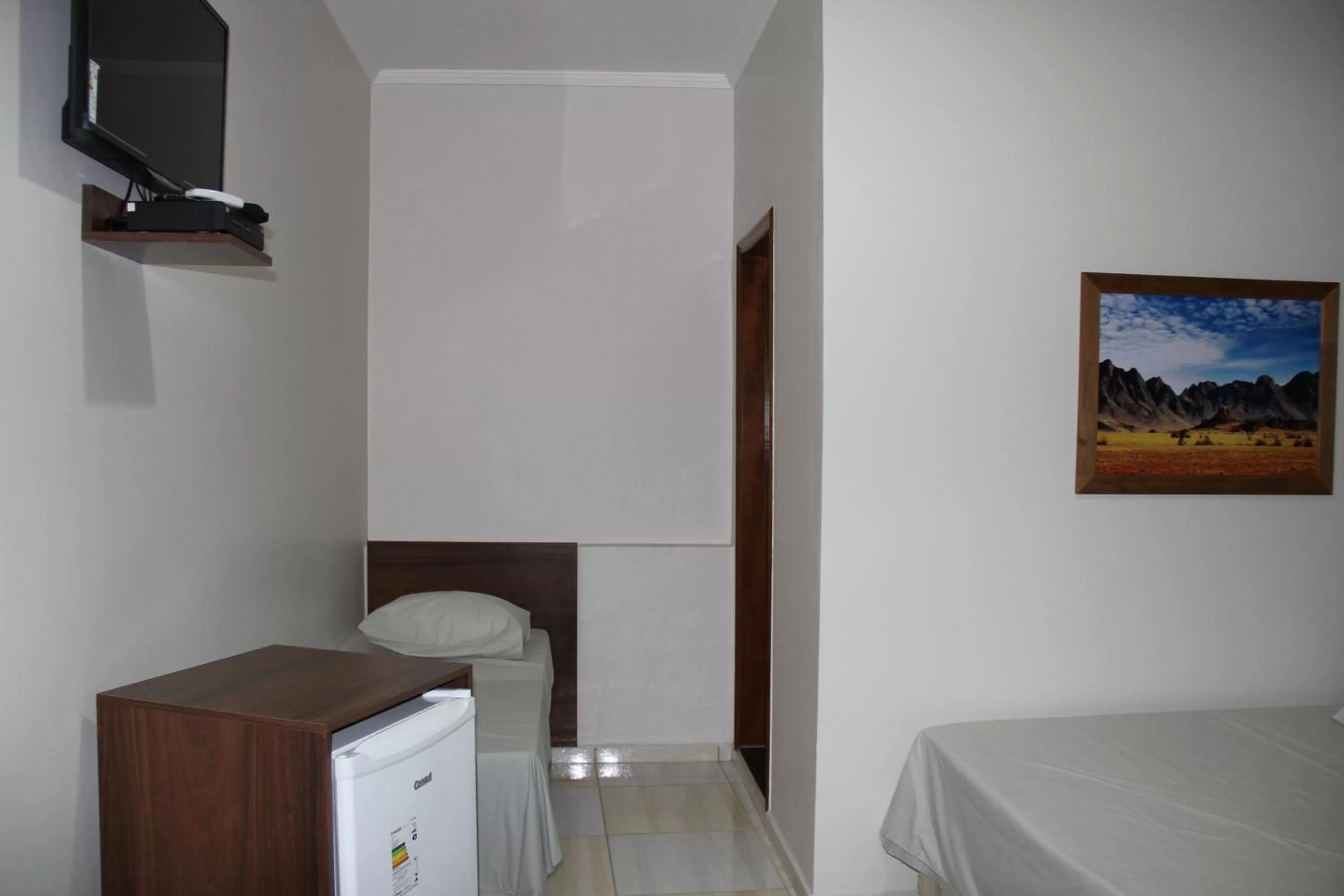 Bed, TV/Entertainment Center in Hotel Joia Fina