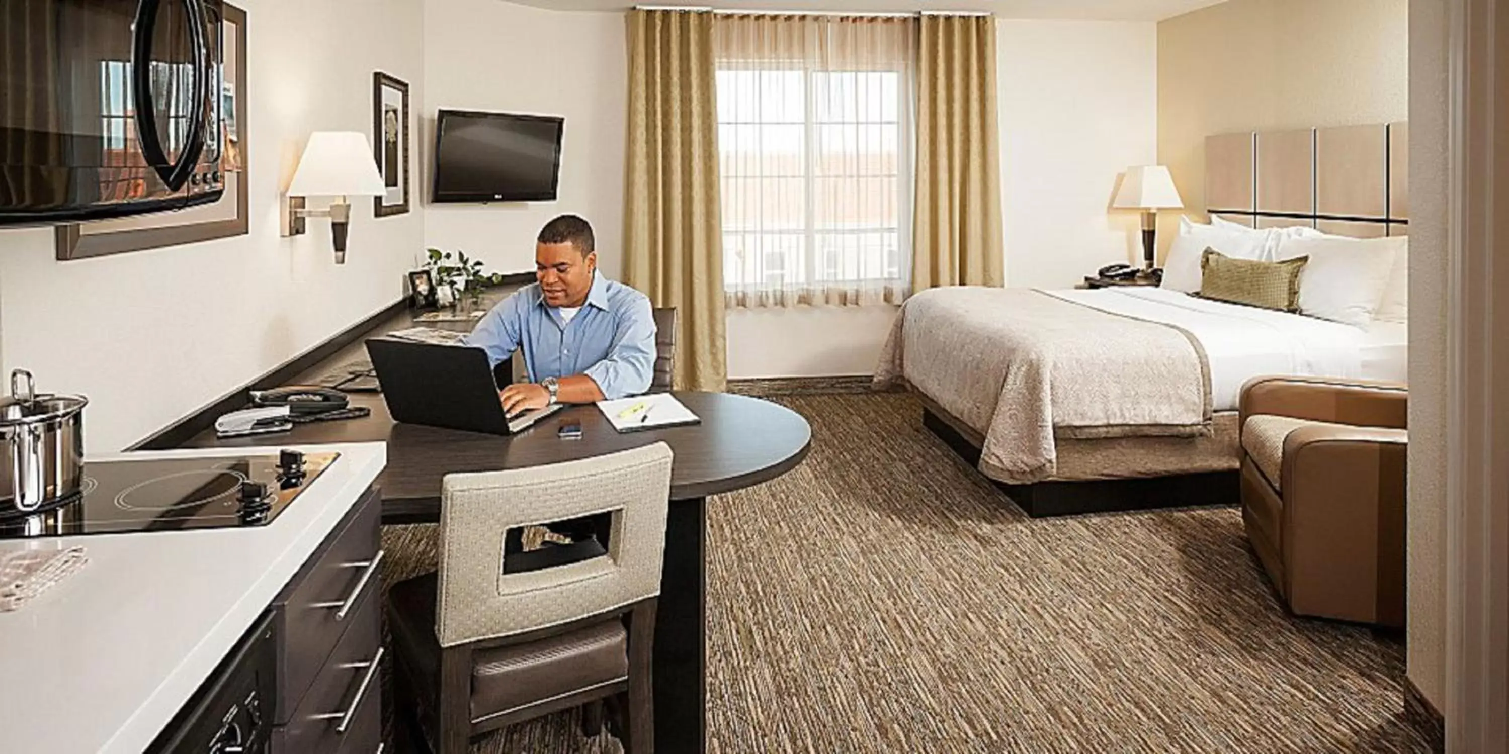 People in Candlewood Suites DFW West - Hurst, an IHG Hotel