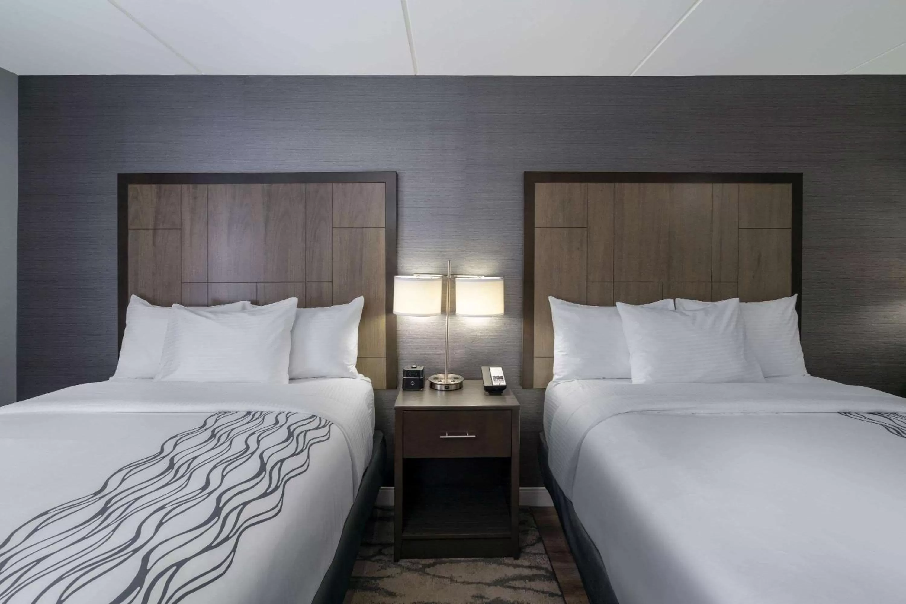 Photo of the whole room, Bed in La Quinta by Wyndham Raleigh Downtown North