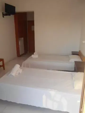 Bed in Hotel Kourkoumelata