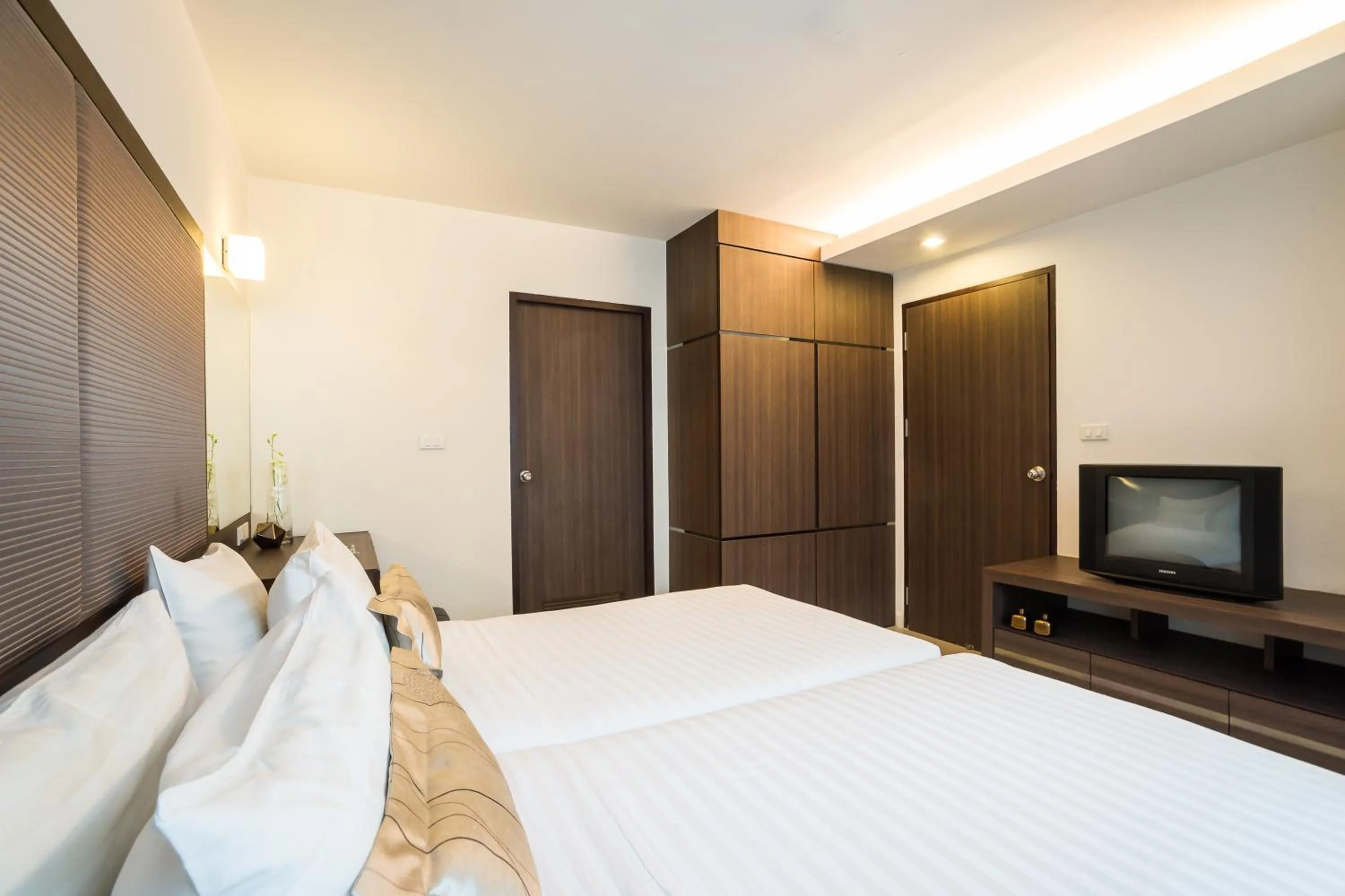 Photo of the whole room, Bed in Beyond Suite