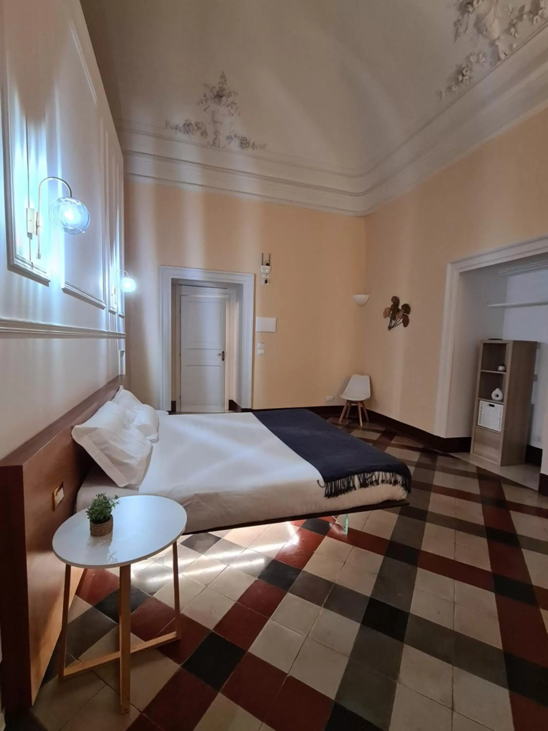 Bed in Toscano Palace Luxury Rooms Catania