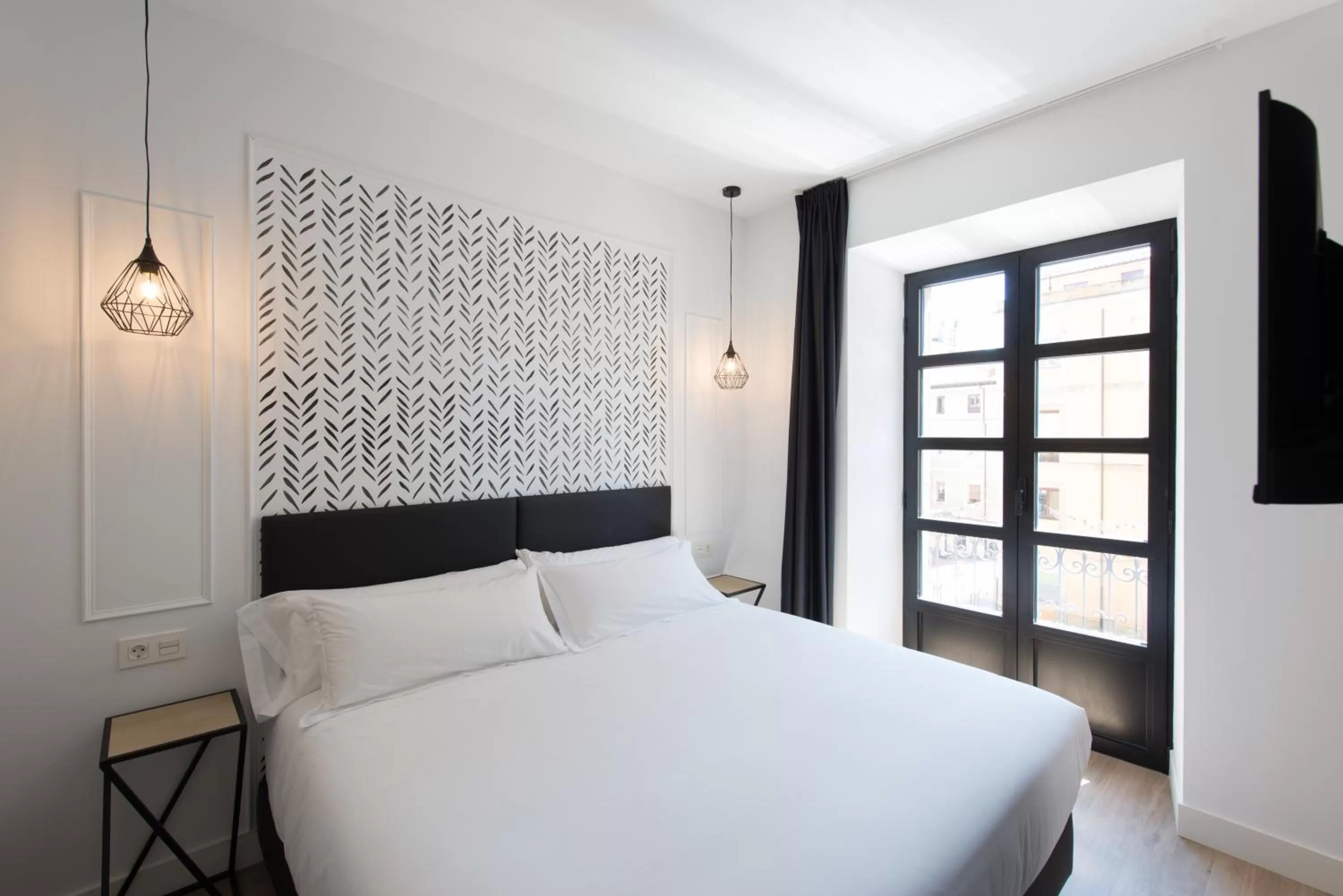 Bed in Santa Catalina Suites Gijón