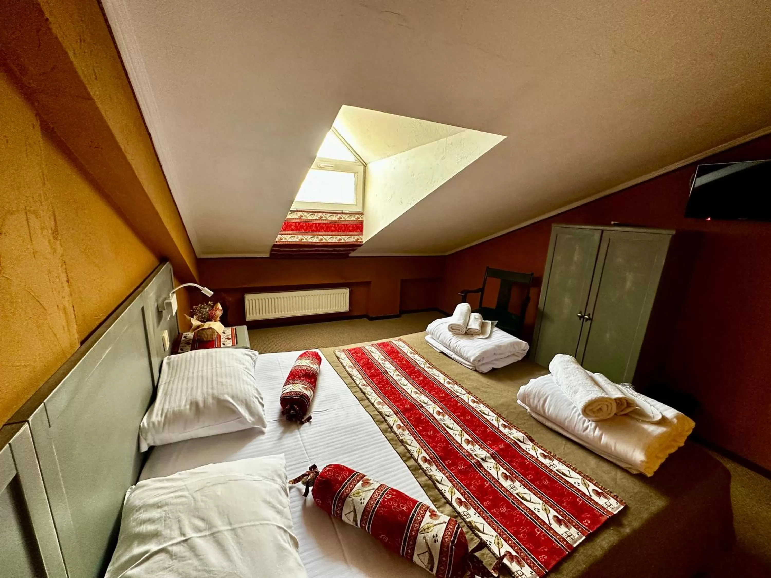 Bed in Kindli Boutique Hotel