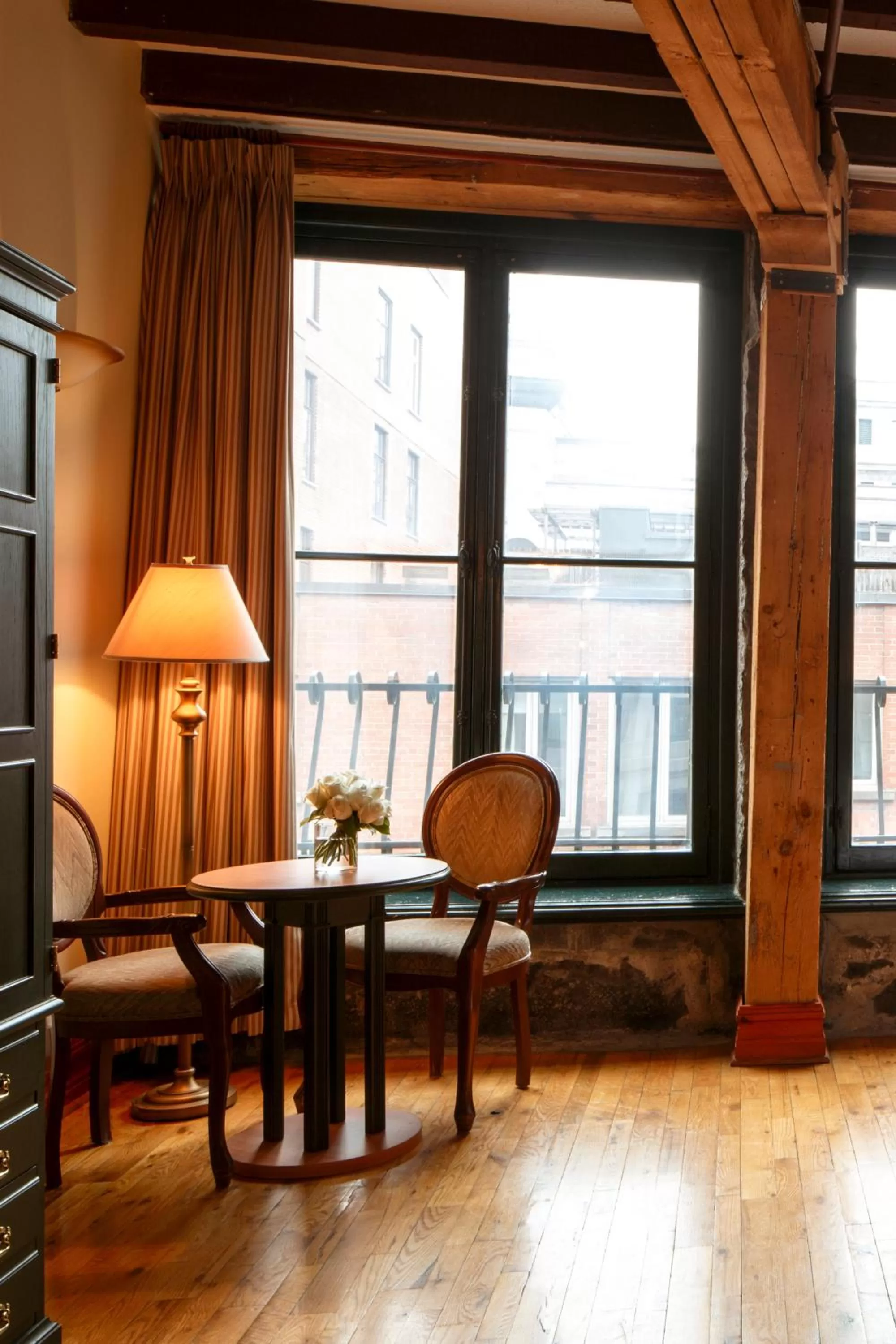 Seating area in Auberge du Vieux Port by Gray Collection